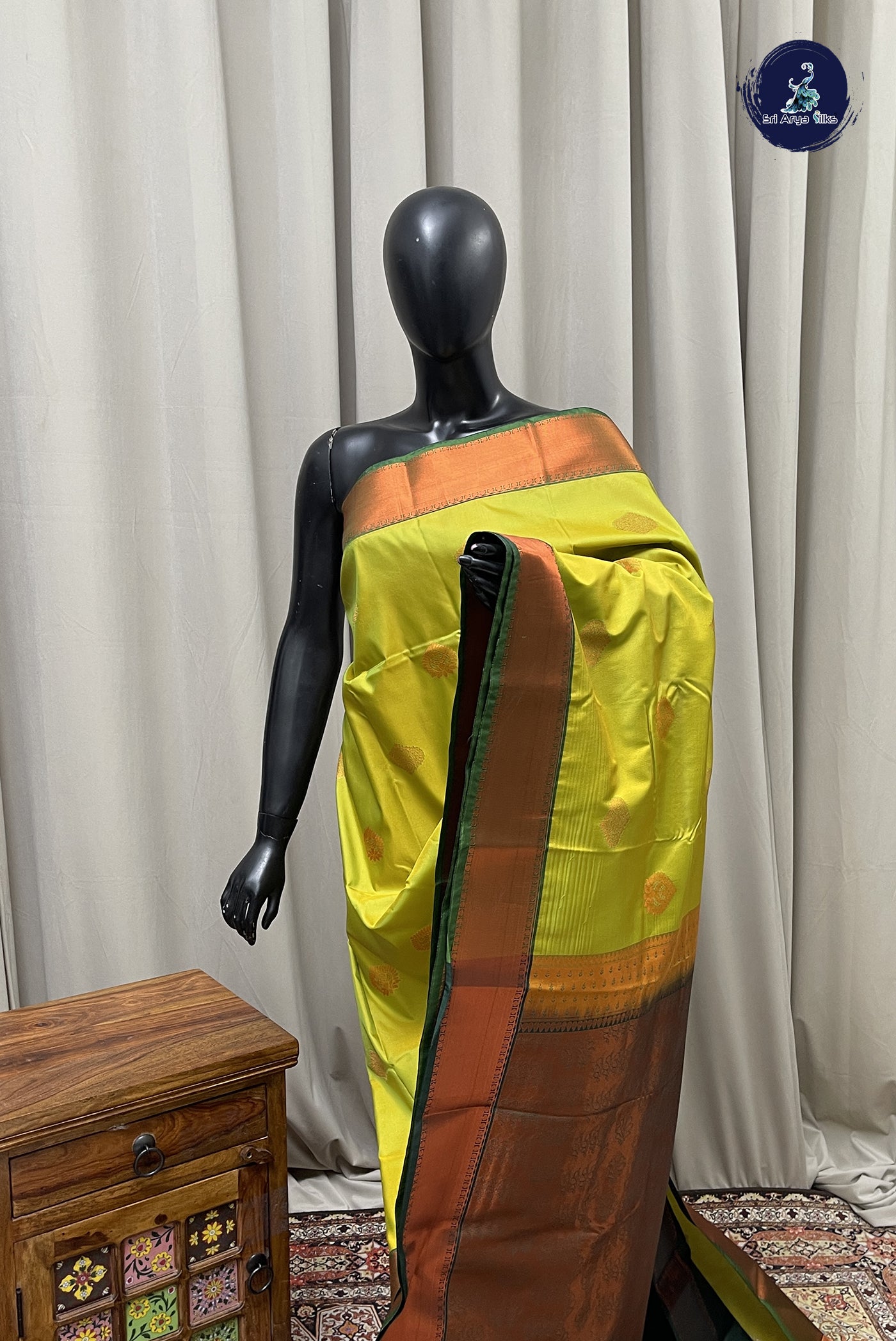 Lime Green Semi Silk Saree With Copper Zari Buttas Pattern