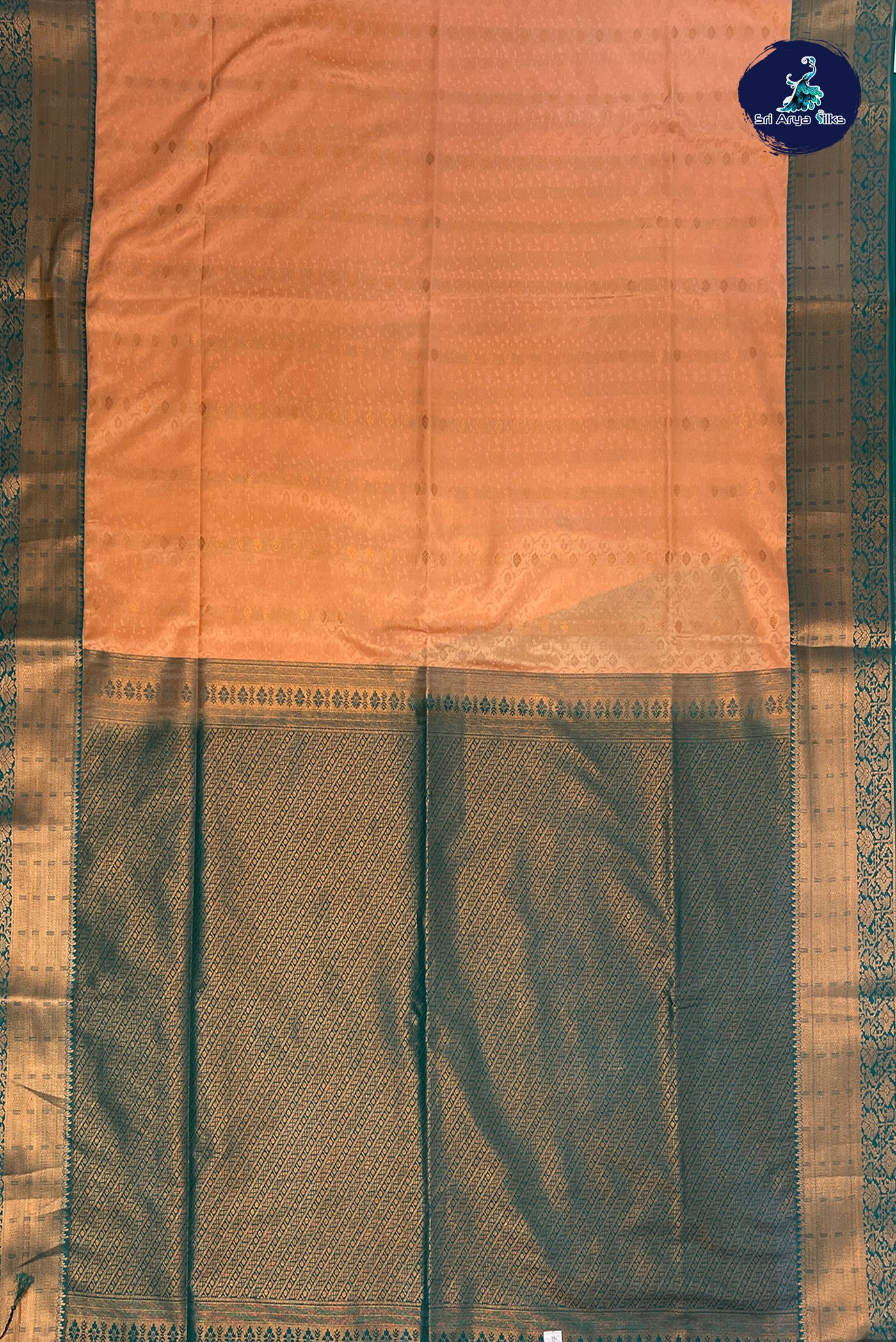 Light Peach Semi Silk Saree With Embossed Pattern