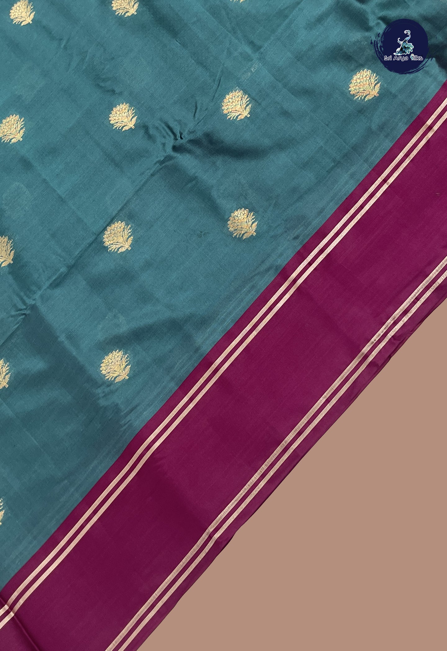 Teal Semi Silk Saree With Zari Buttas Pattern