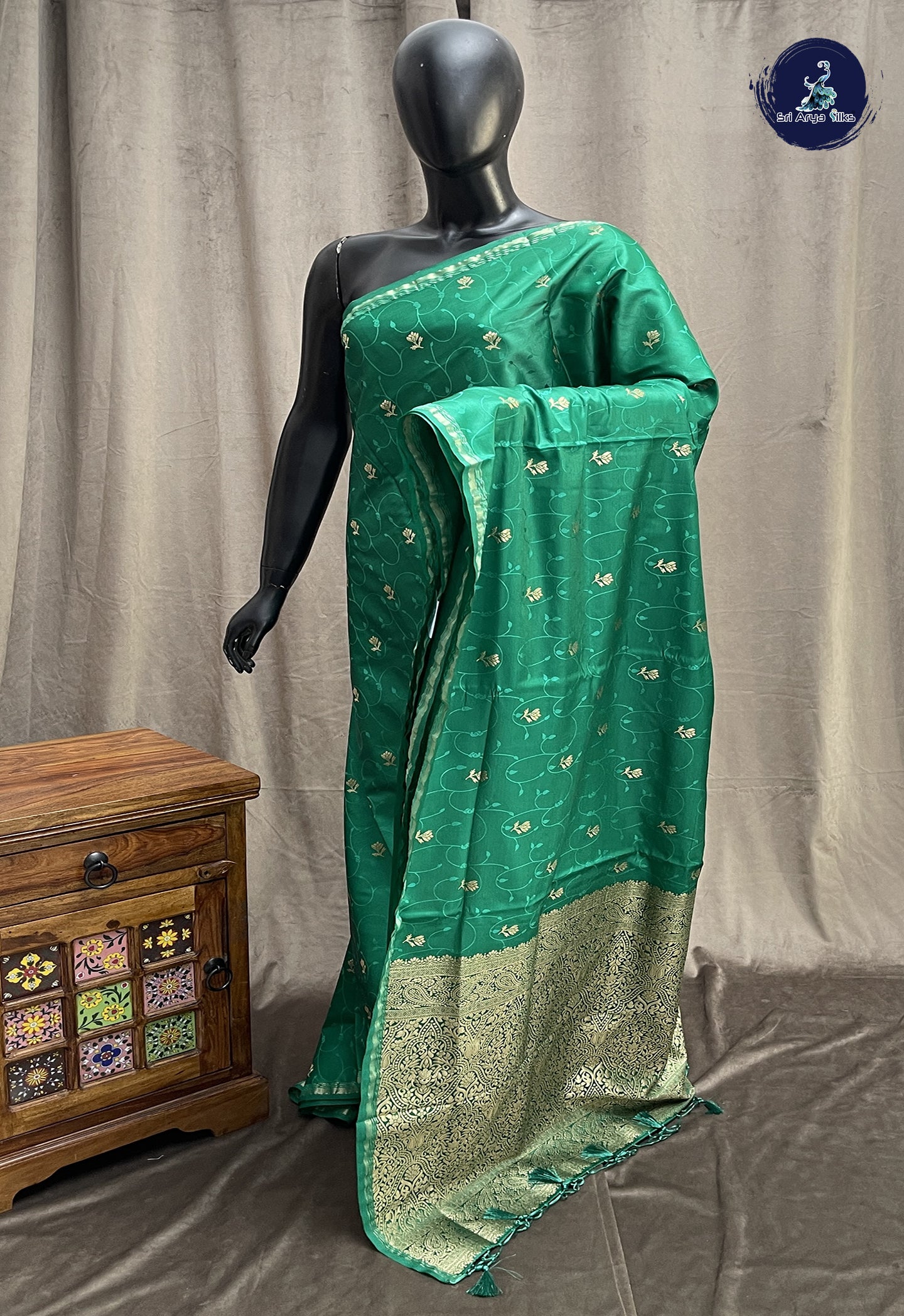 Sapphire Green Semi Soft Silk Saree With Embossed Pattern