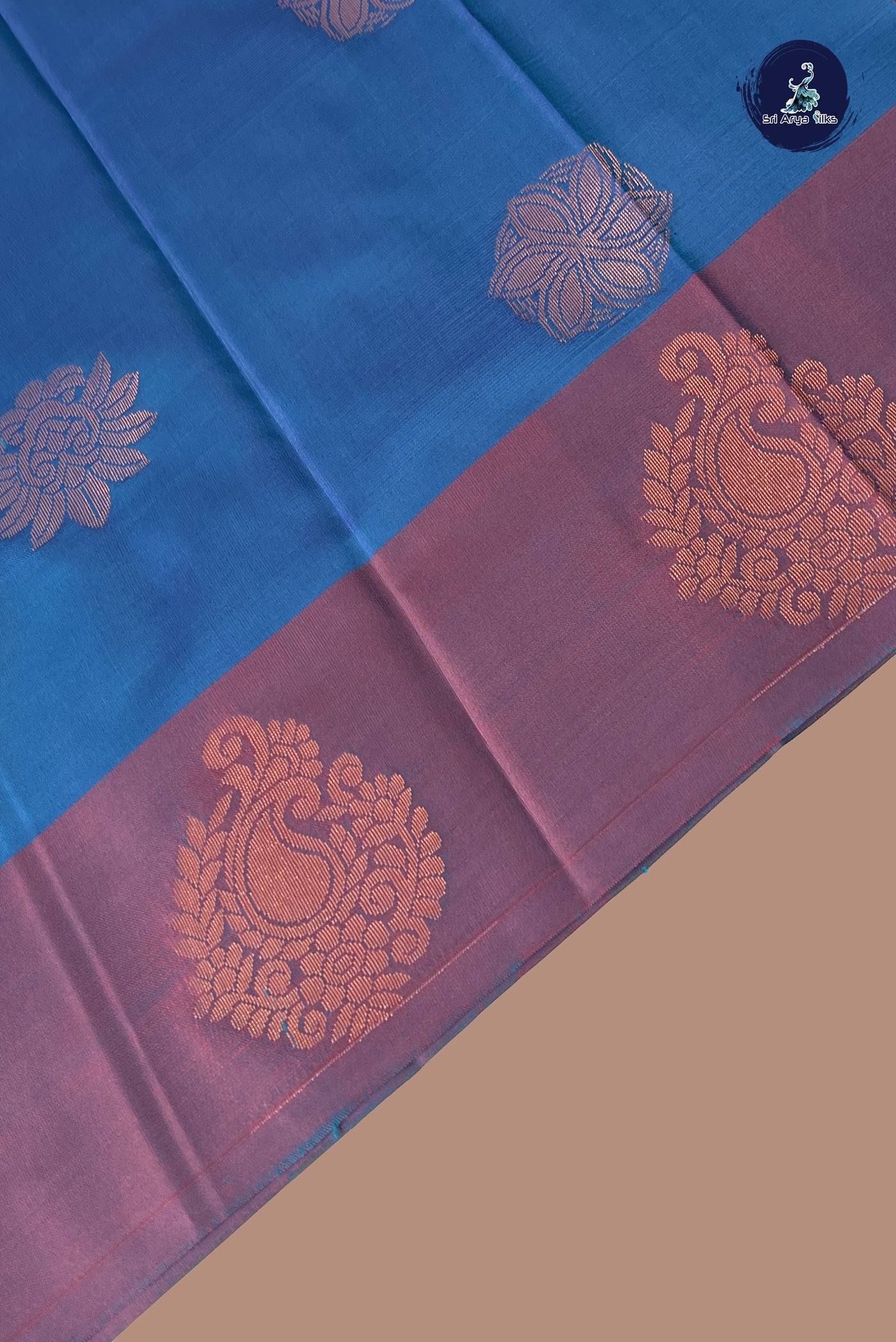 Peacock Blue Semi Soft Silk Saree With Zari Buttas Pattern