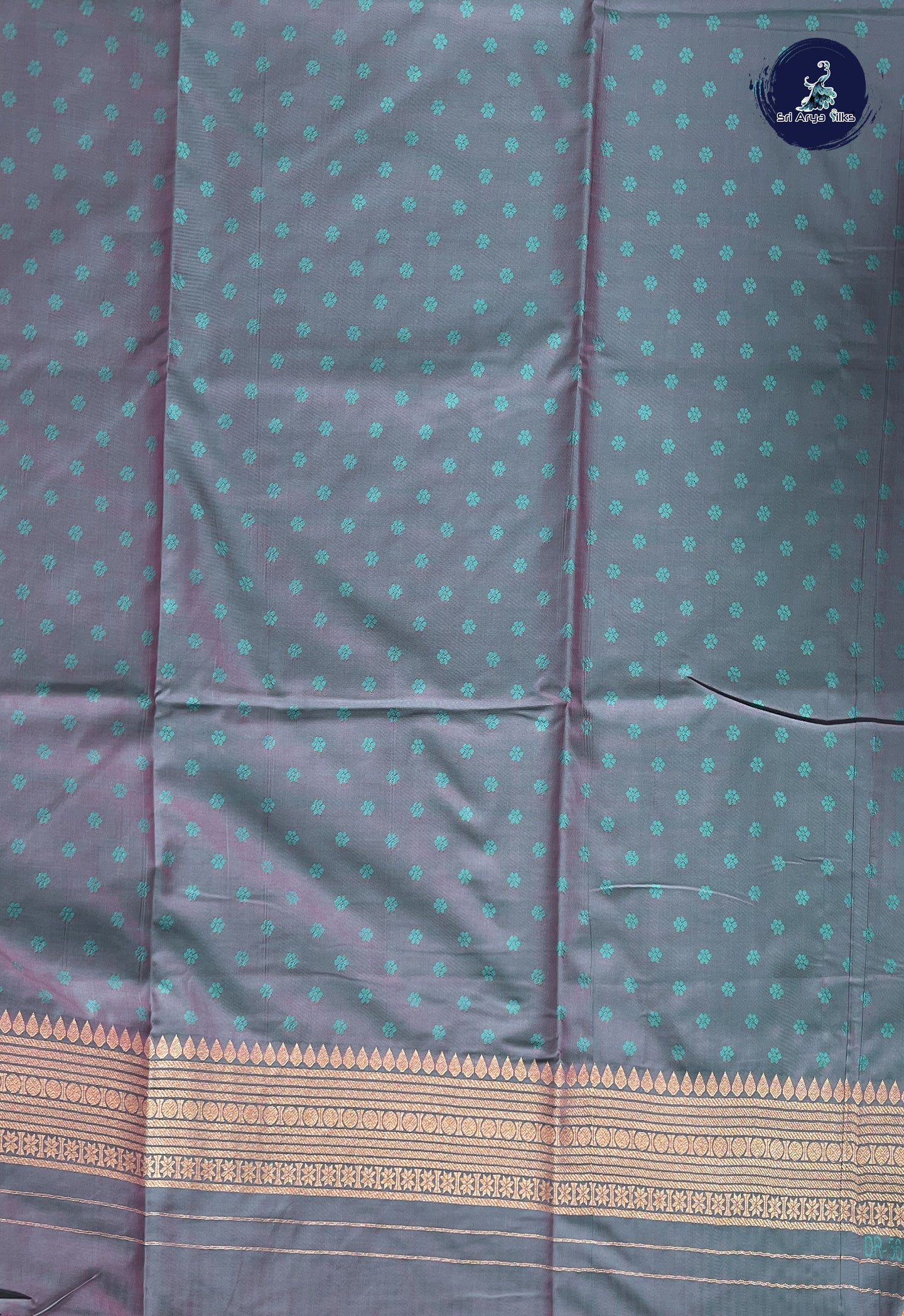 Pinkish Peach Semi Soft Silk Saree With Zari Buttas Pattern