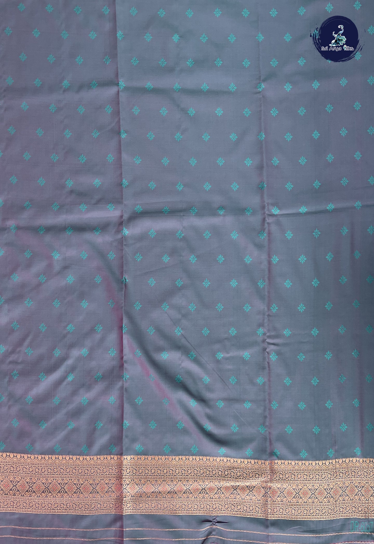 Peach Semi Soft Silk Saree With Zari Buttas Pattern