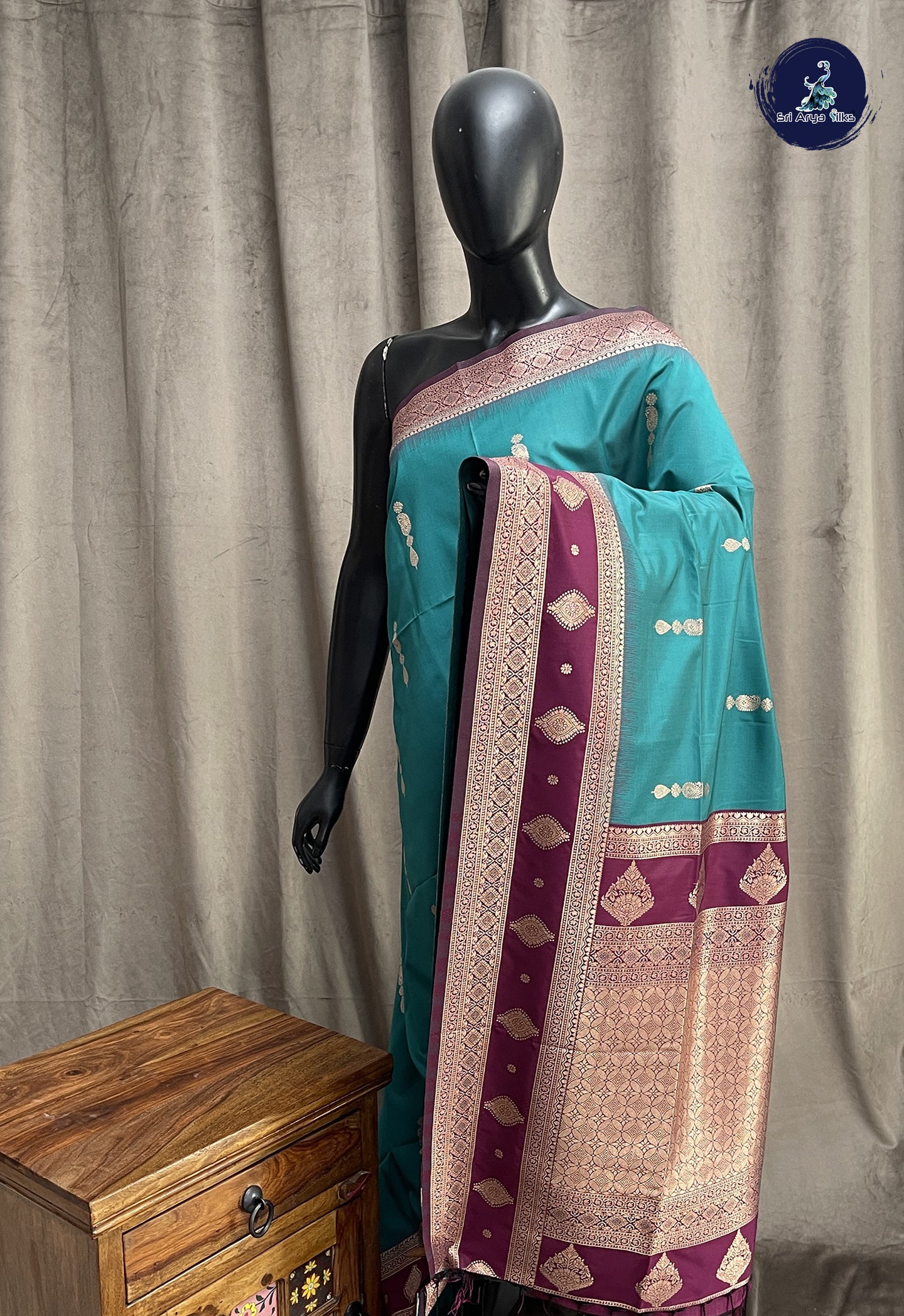 Teal Semi Soft Silk Saree With Zari Buttas Pattern