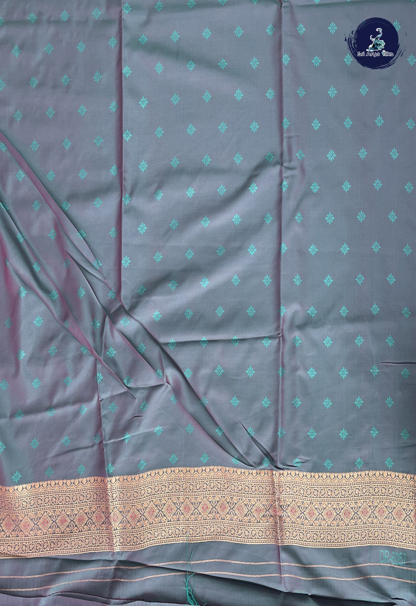 Reddish Pink Semi Soft Silk Saree With Zari Buttas Pattern