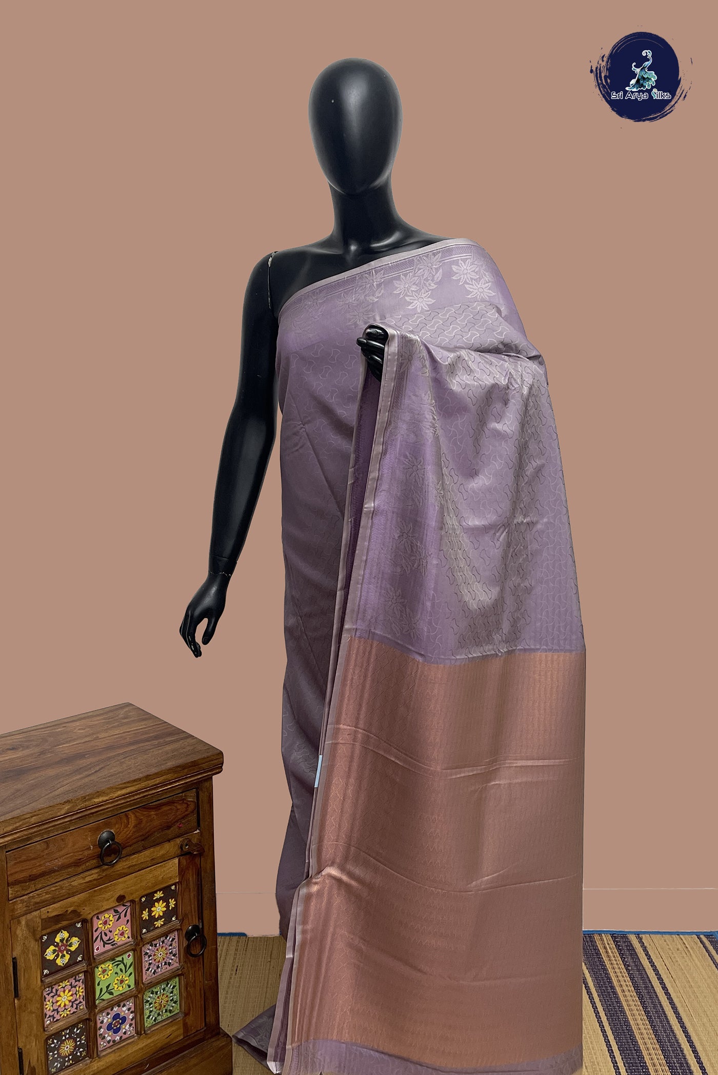 Lavender Semi Soft Silk Saree With Embossed Pattern