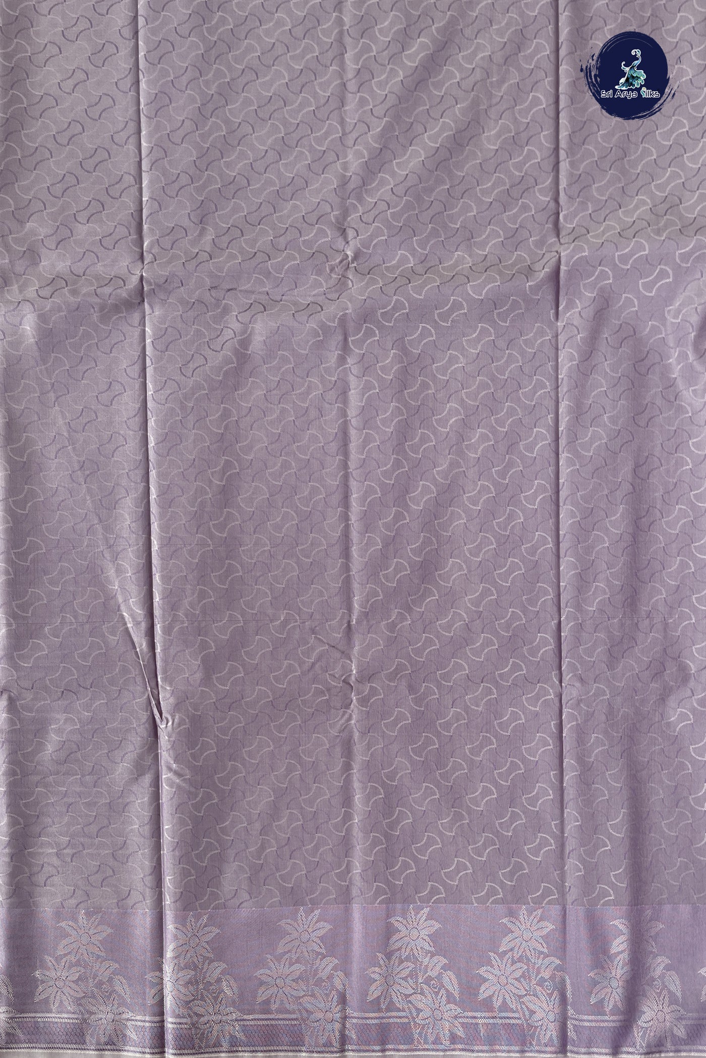 Lavender Semi Soft Silk Saree With Embossed Pattern