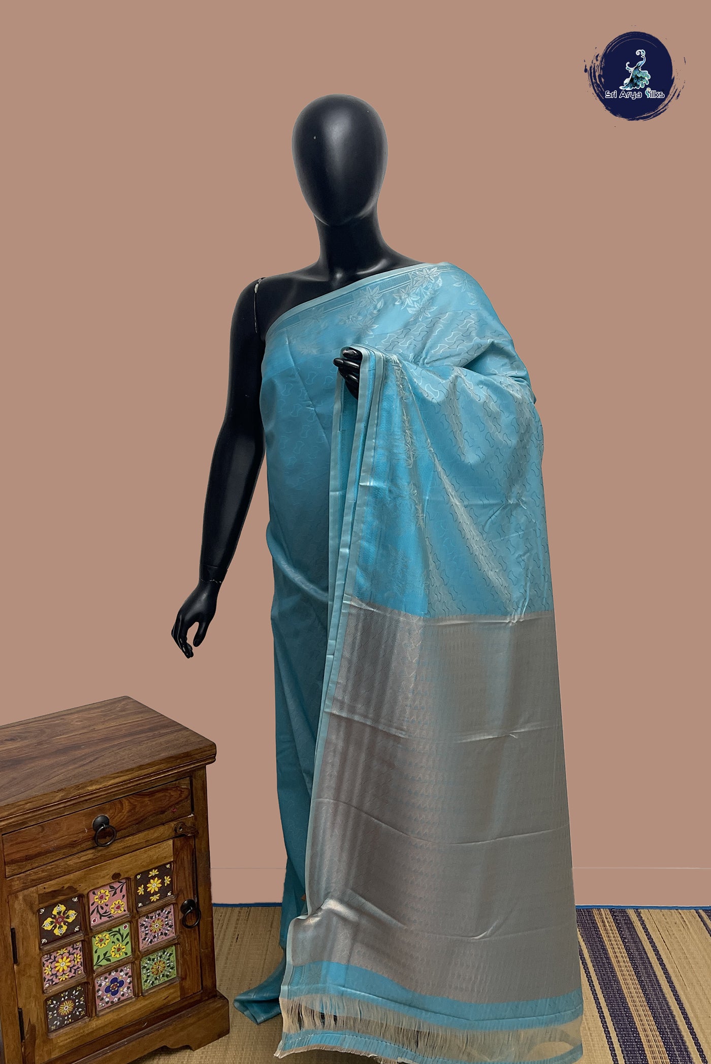Blue Semi Soft Silk Saree With Embossed Pattern