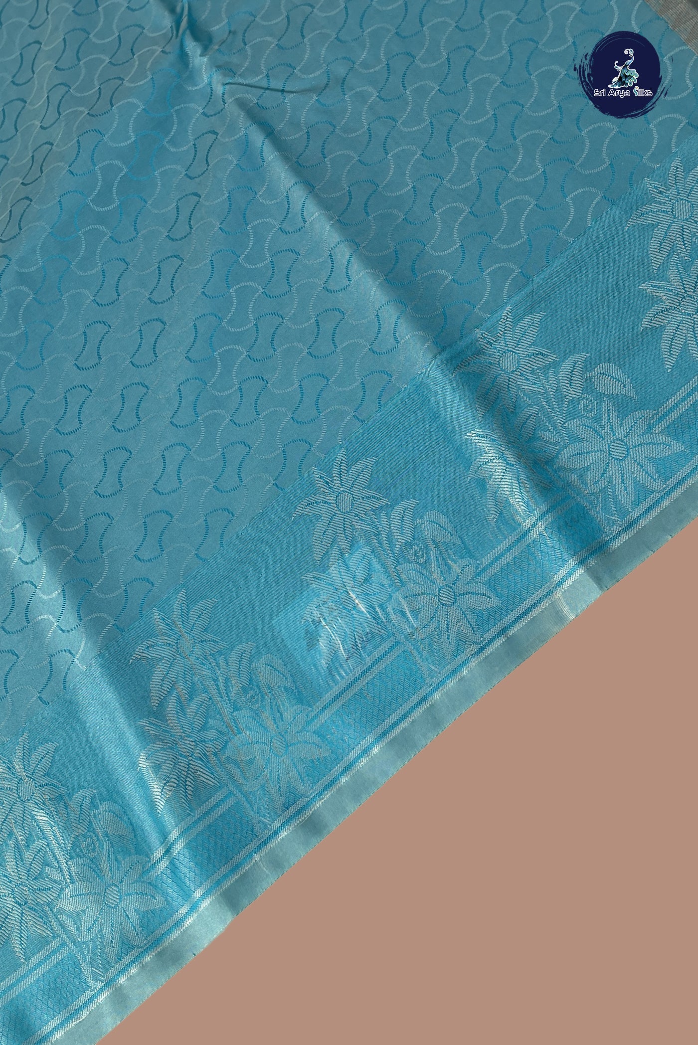 Blue Semi Soft Silk Saree With Embossed Pattern