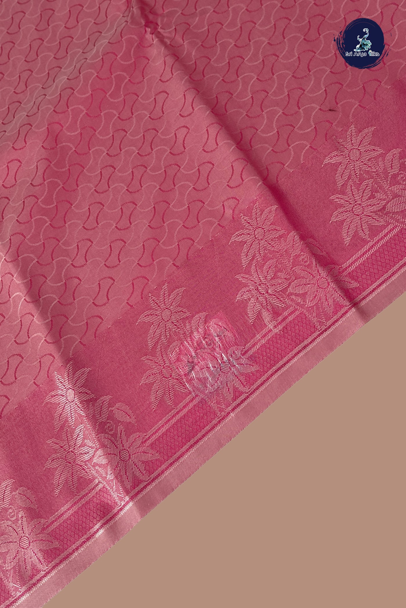 Pink Semi Soft Silk Saree With Embossed Pattern