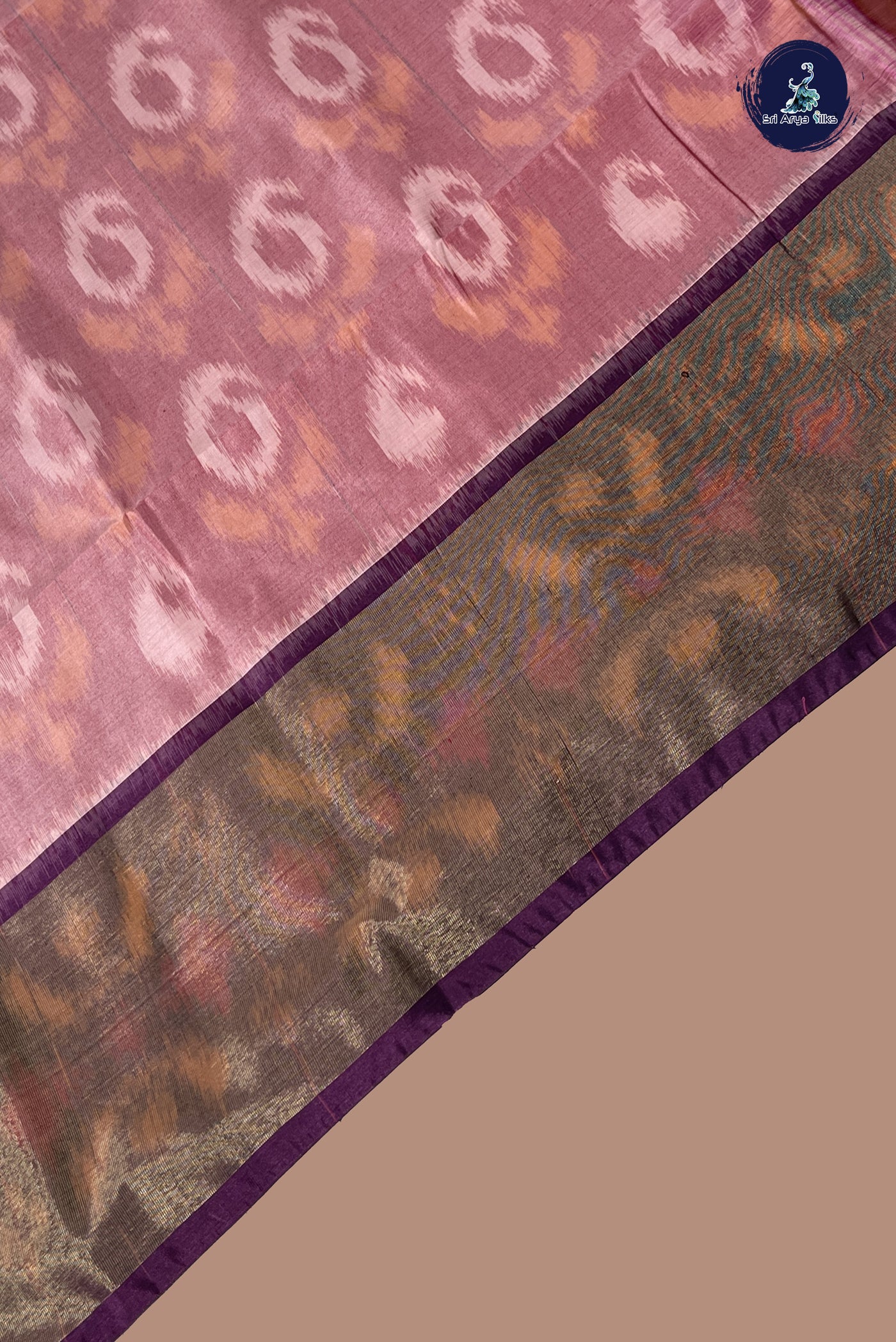 Mauve Semi Soft Silk Saree With Ikat Pattern
