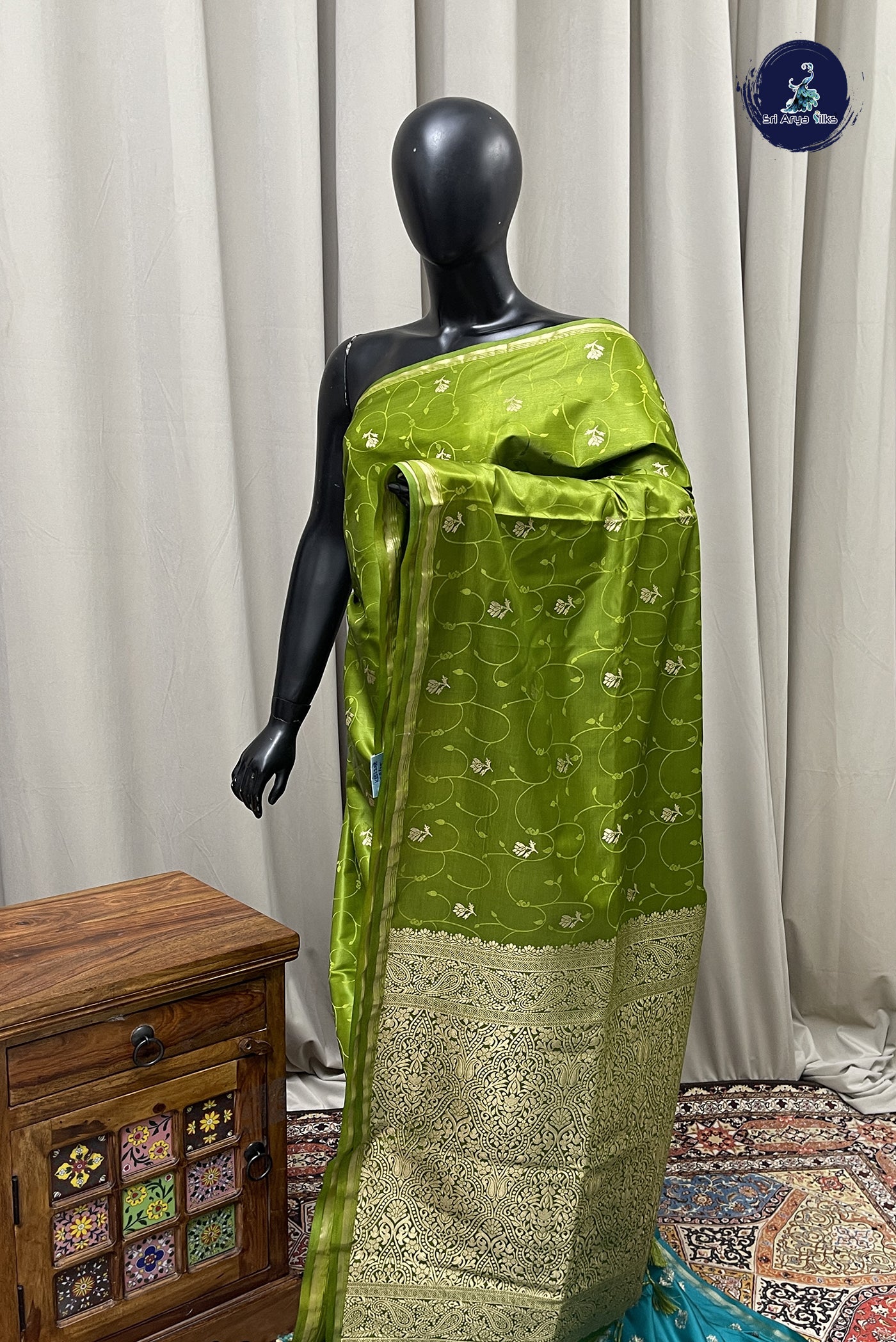 Mehendi Green Semi Silk Saree With Embossed Pattern