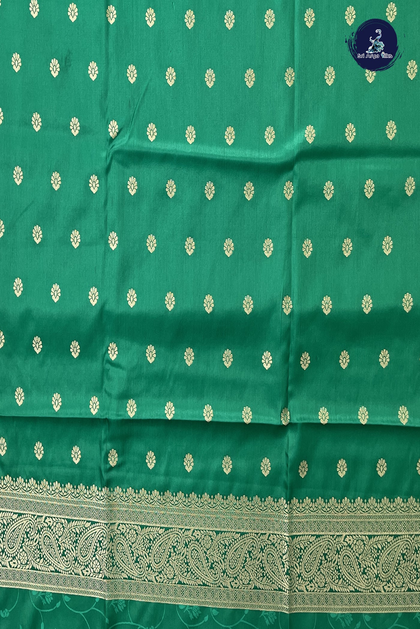 Green Semi Silk Saree With Embossed Pattern