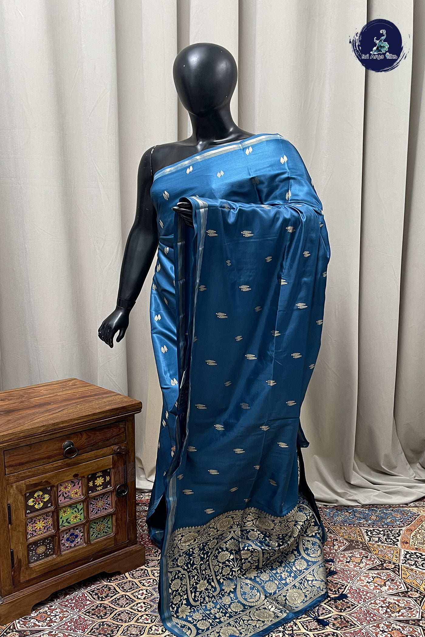 Peacock Blue Semi Silk Saree With Zari Buttas Pattern