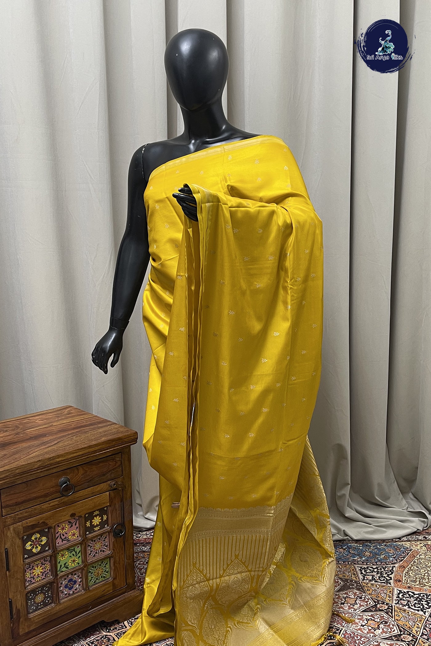 Lemon Yellow Semi Silk Saree With Zari Buttas Pattern