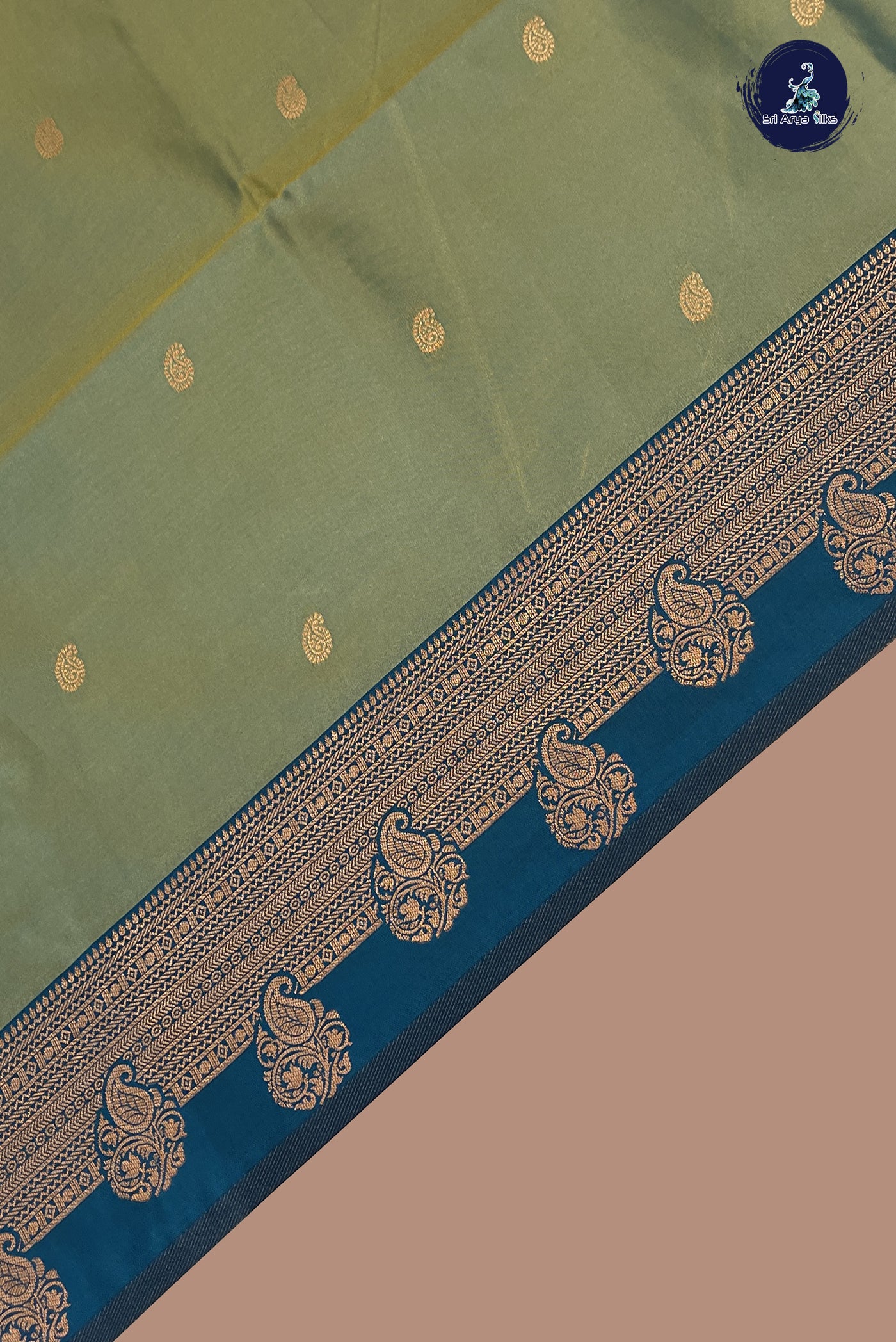 Bluish Green Semi Silk Saree With Zari Buttas Pattern