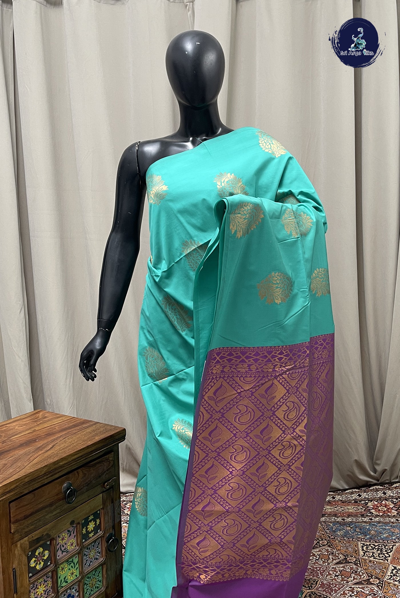 Turquoise Semi Soft Silk Saree With Zari Buttas Pattern