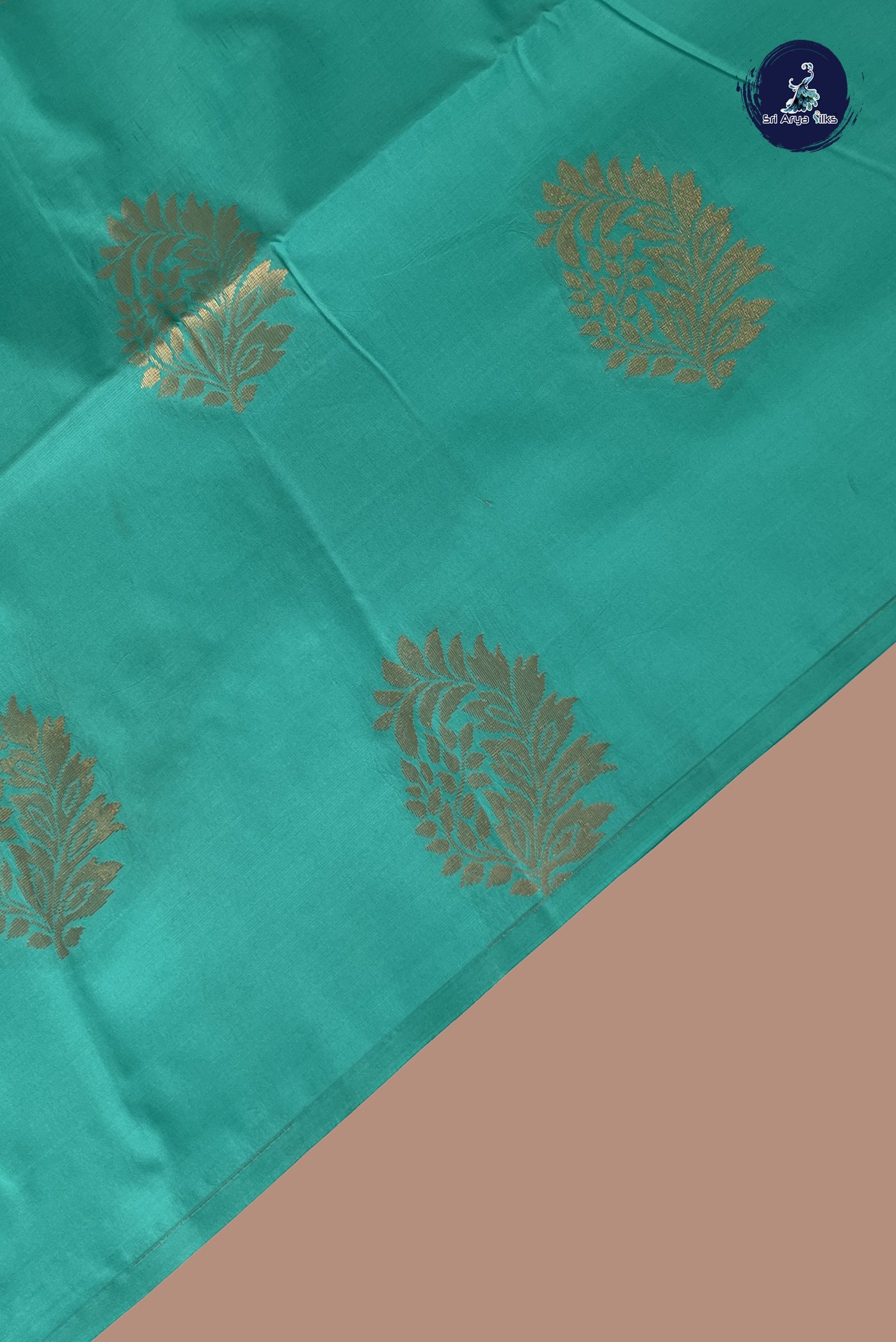 Turquoise Semi Soft Silk Saree With Zari Buttas Pattern