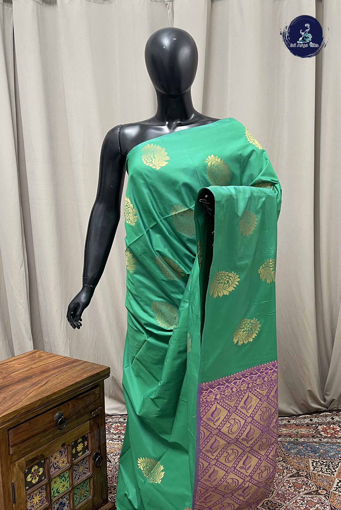 Green Semi Soft Silk Saree With Zari Buttas Pattern