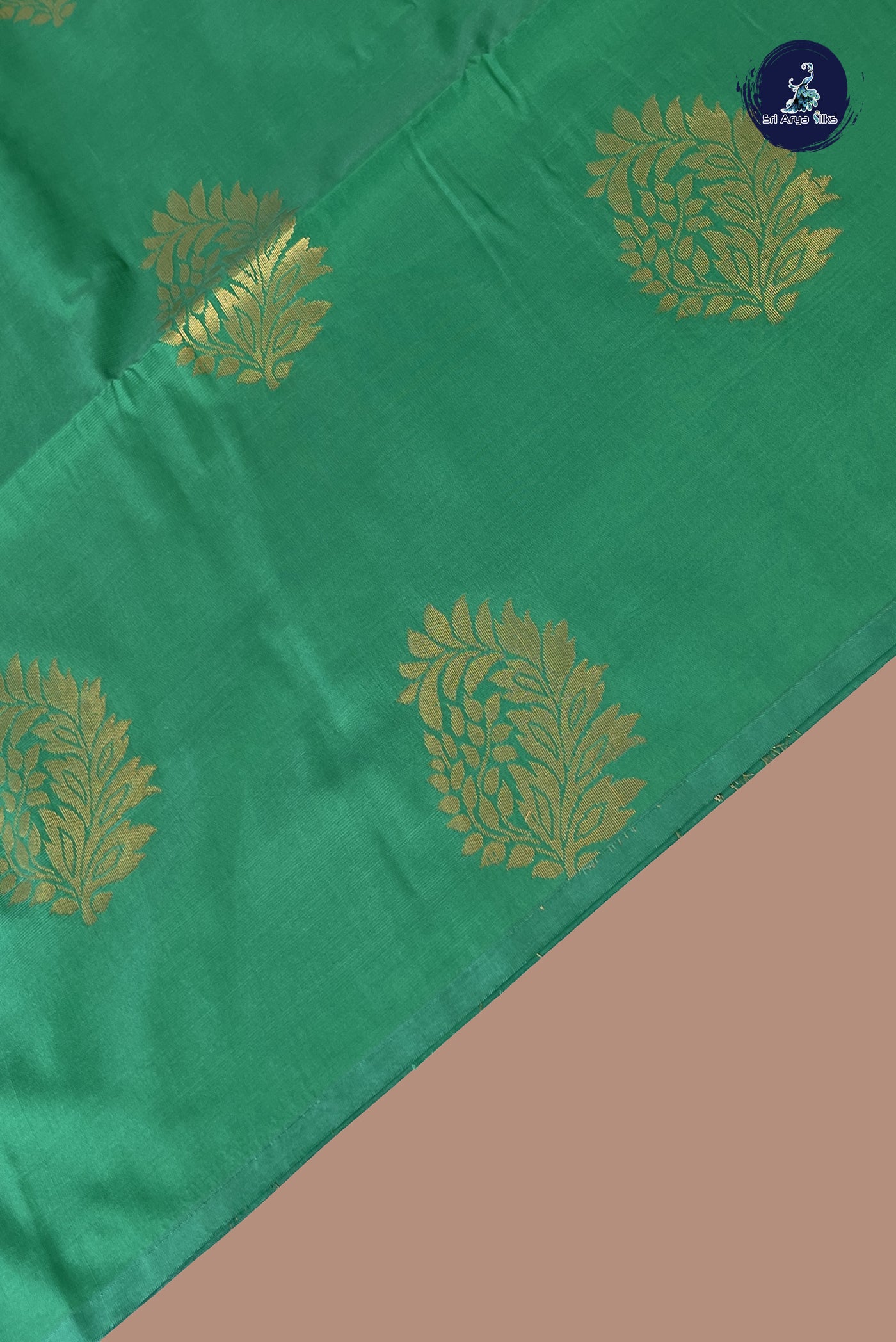 Green Semi Soft Silk Saree With Zari Buttas Pattern