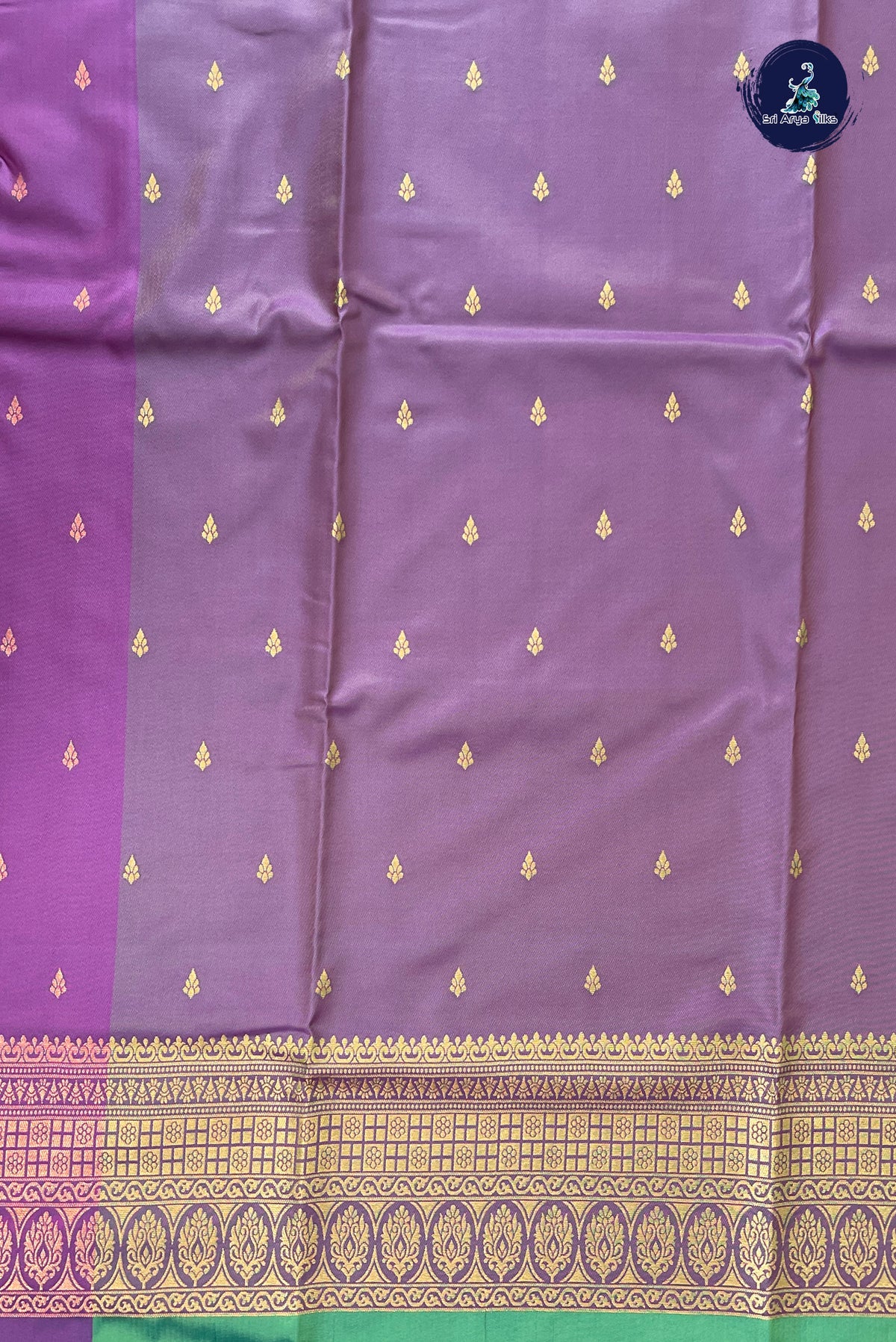 Bluish Green Semi Silk Saree With Zari Buttas Pattern