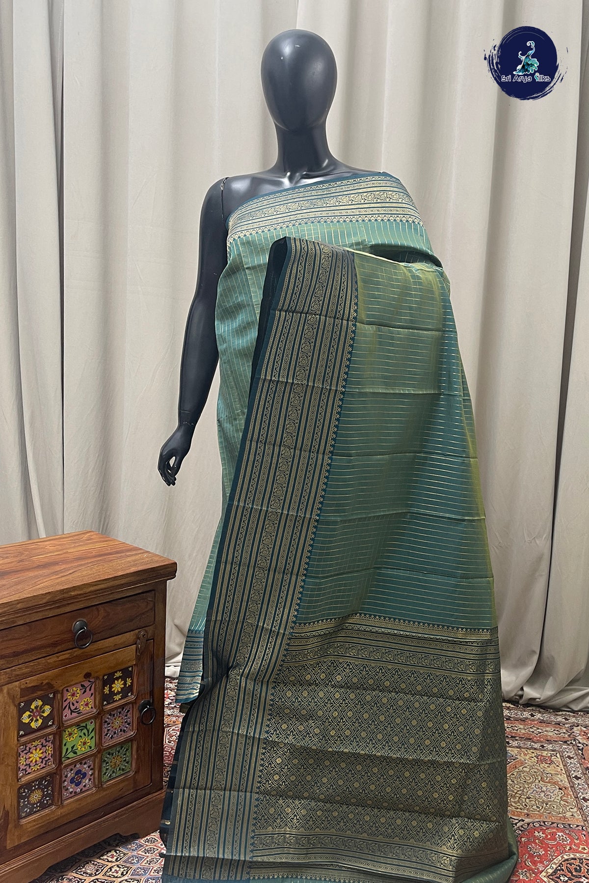 Bluish Green Semi Silk Saree With Zari Checked Pattern