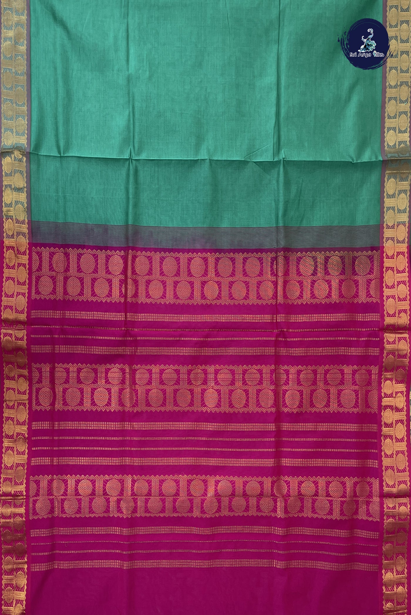 Green Madisar Semi Silk Cotton Saree With Plain Pattern
