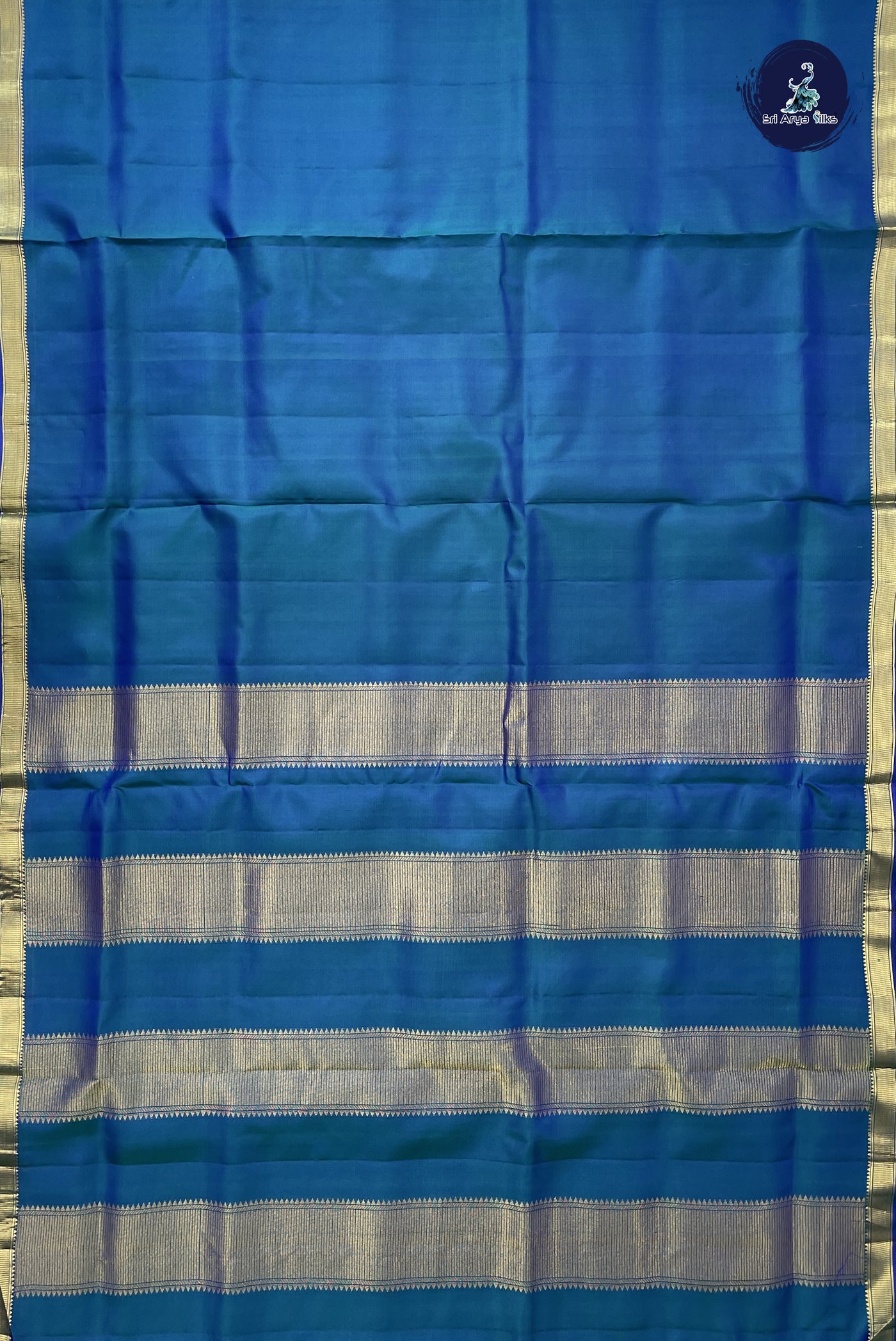 Peacock Blue Madisar 10 Yards Silk Saree With Plain Pattern