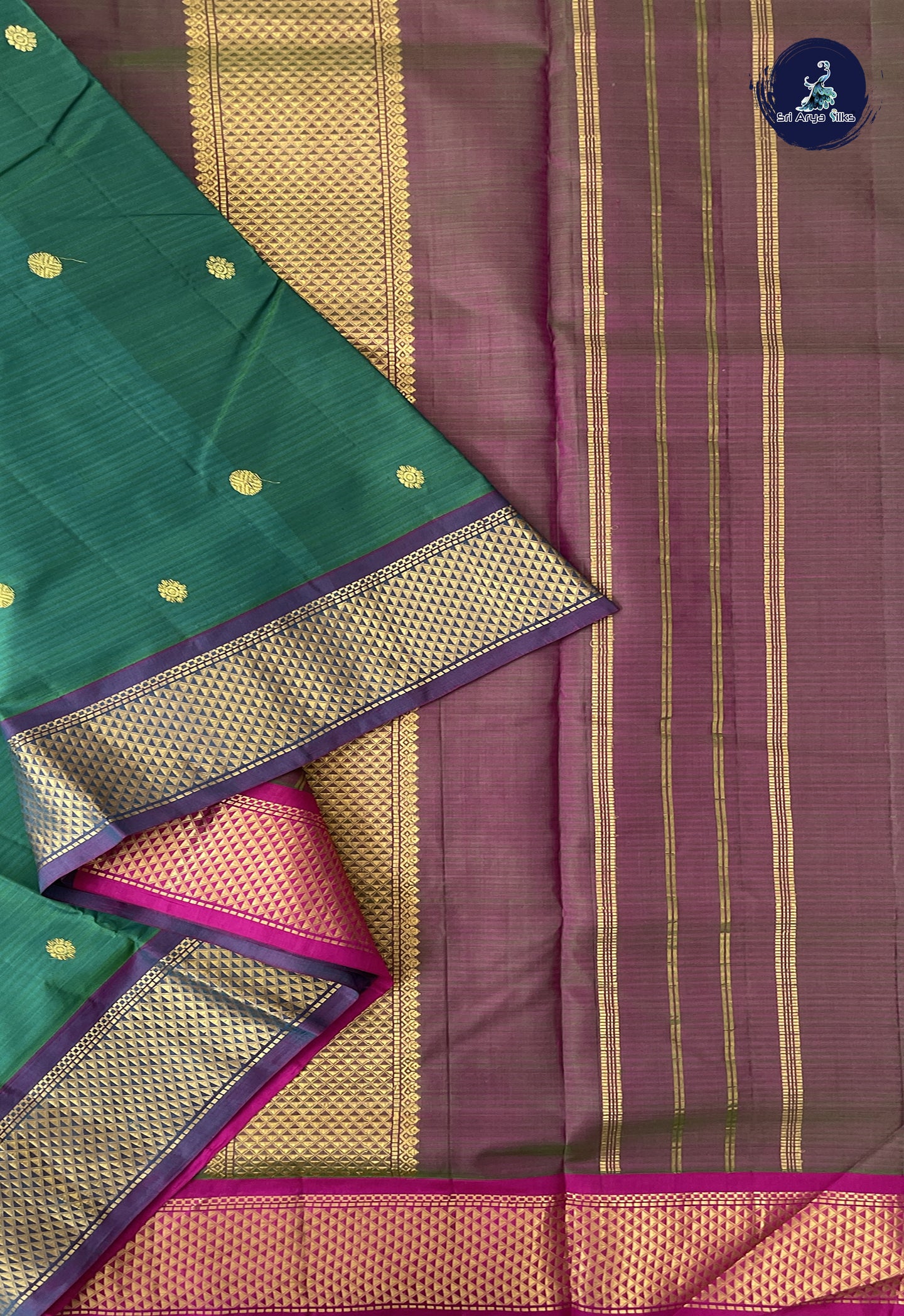Dark Green Madisar 10 Yards Silk Saree With Zari Buttas Pattern