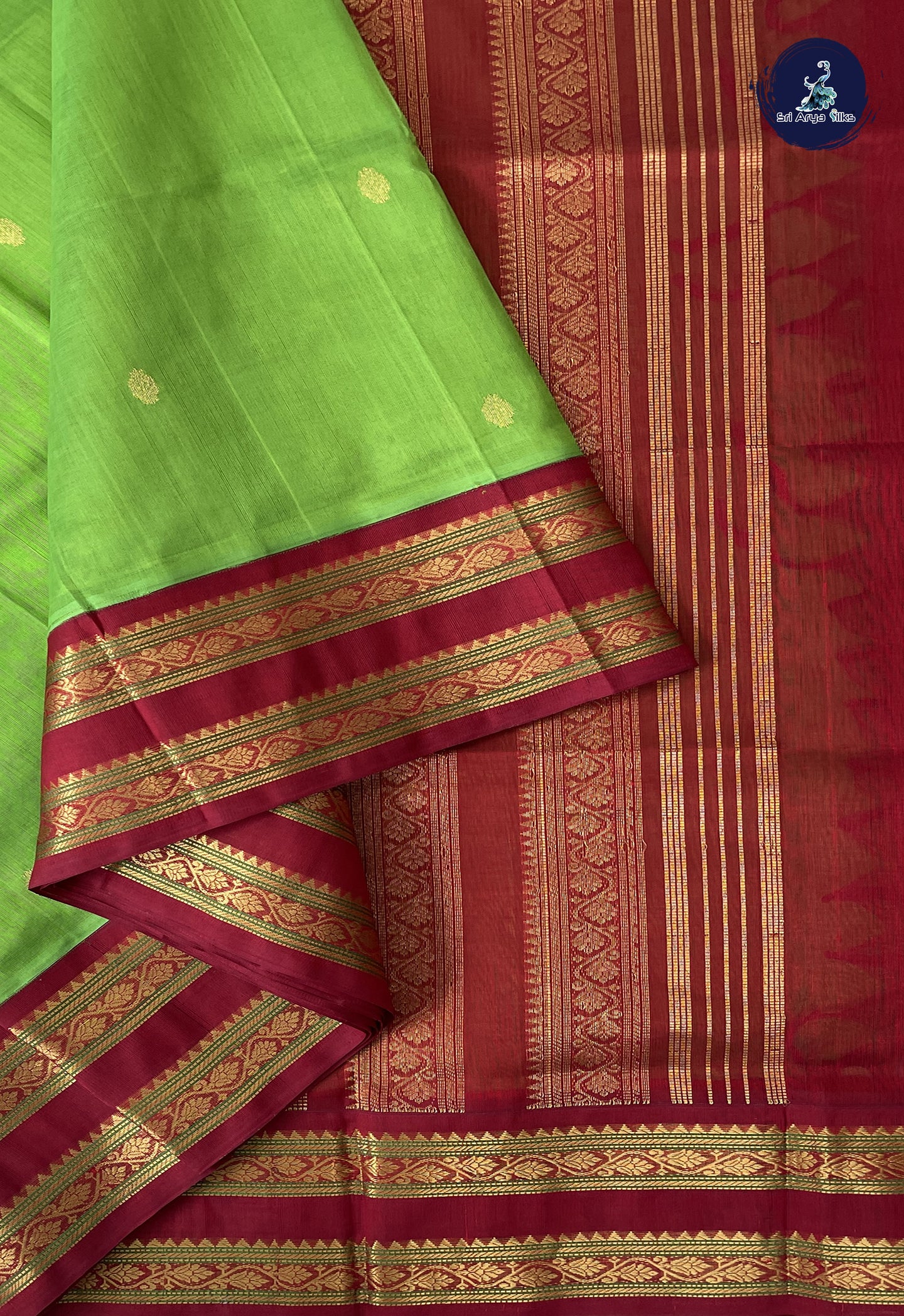 Parrot Green 10 Yards Silk Cotton Saree With Zari Buttas Pattern