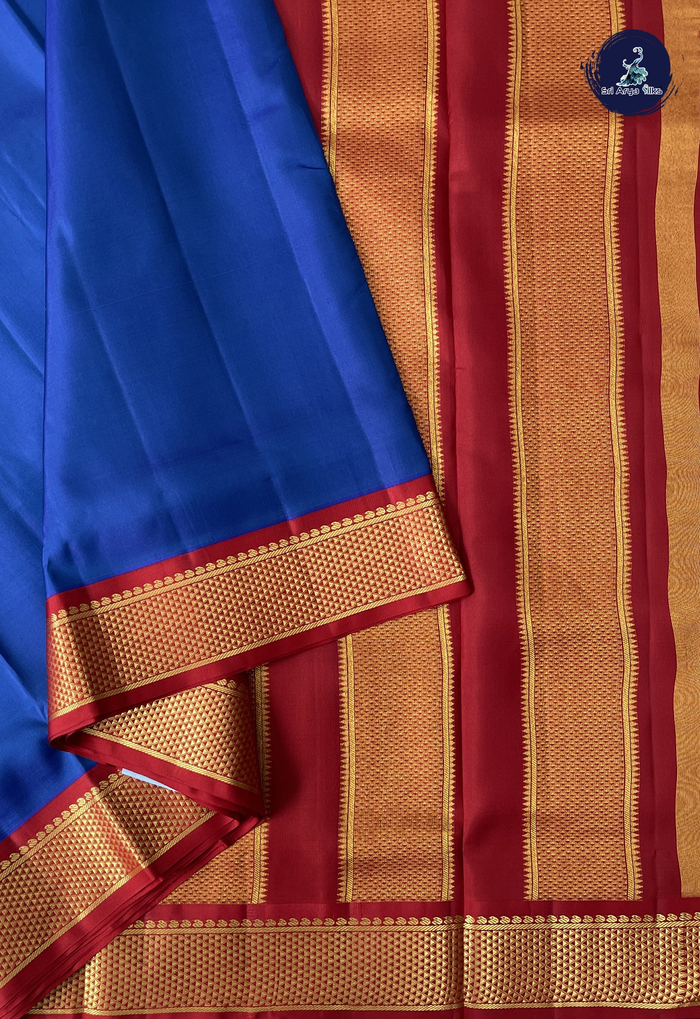 Peacock Blue Madisar 10 Yards Silk Saree With Plain Pattern