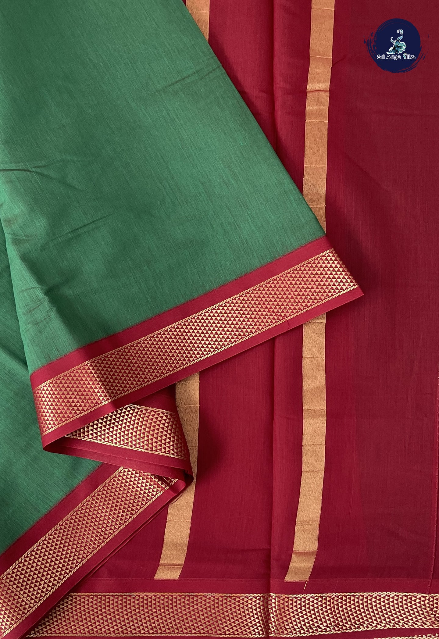 Green Madisar Semi Silk Cotton Saree With Plain Pattern