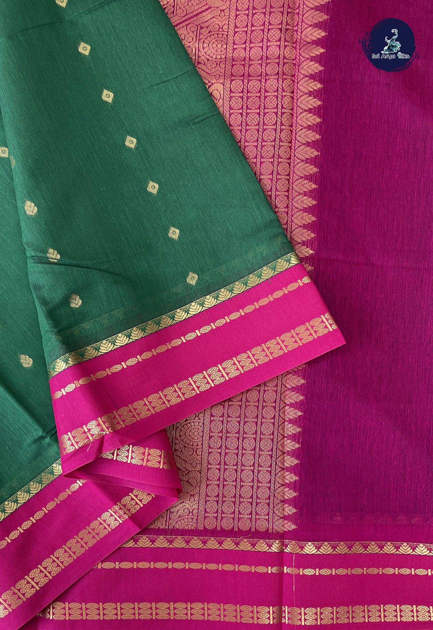 Dark Green Madisar Semi Silk Cotton Saree With Zari Buttas Pattern