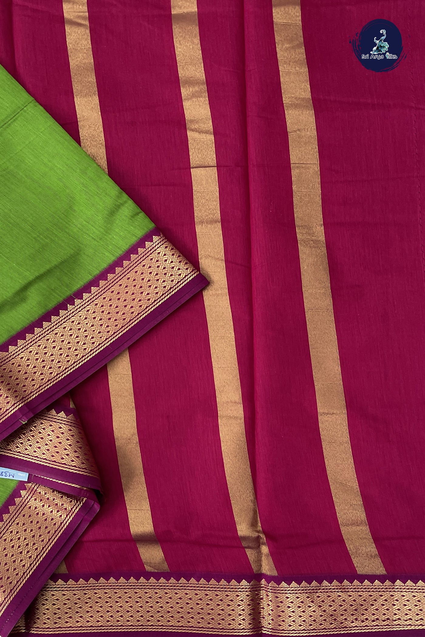 Parrot Green Madisar Semi Silk Cotton Saree With Plain Pattern