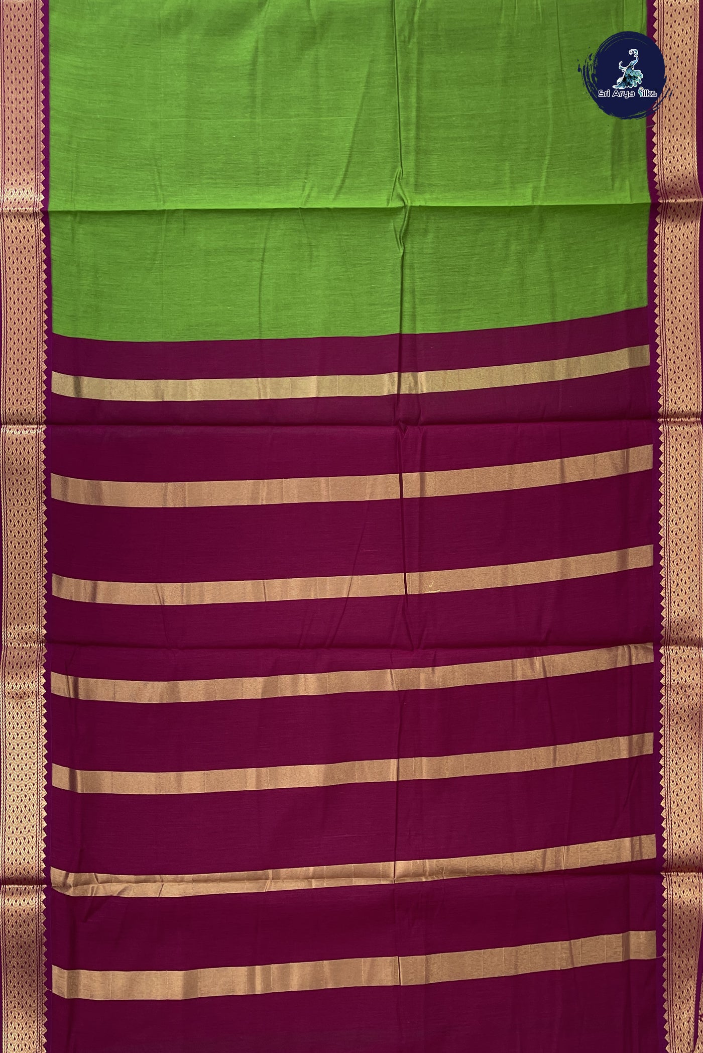 Green Madisar Semi Silk Cotton Saree With Plain Pattern