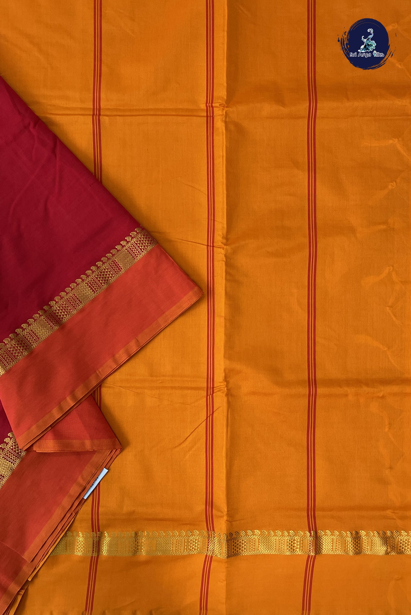 Red Madisar Semi Silk Cotton Saree With Plain Pattern