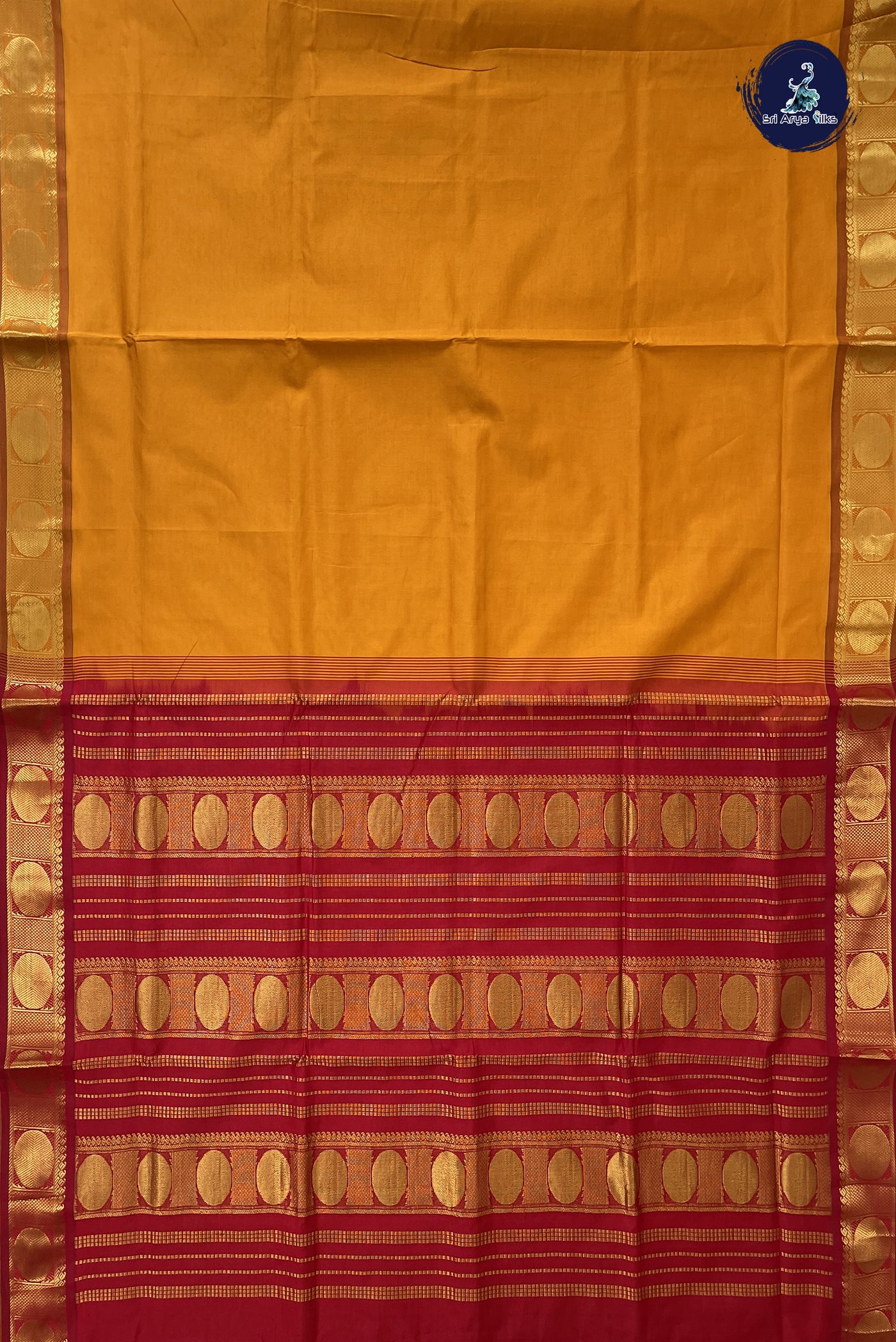Turmeric Yellow Madisar Semi Silk Cotton Saree With Plain Pattern