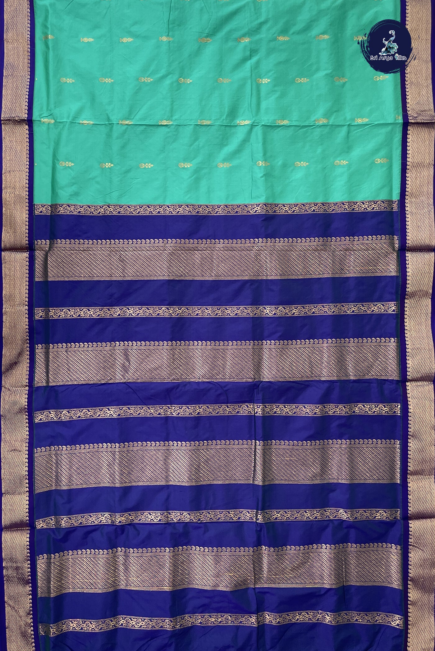 Teal Madisar Semi Silk Saree With Zari Buttas Pattern