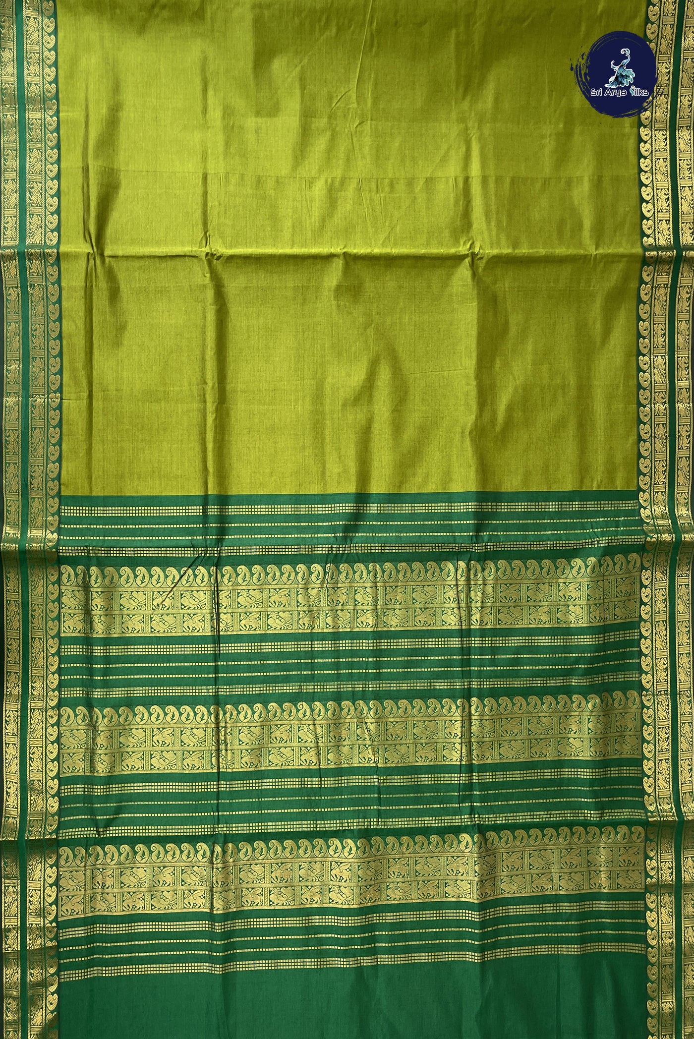 Light Green Madisar Semi Silk Cotton Saree With Plain Pattern