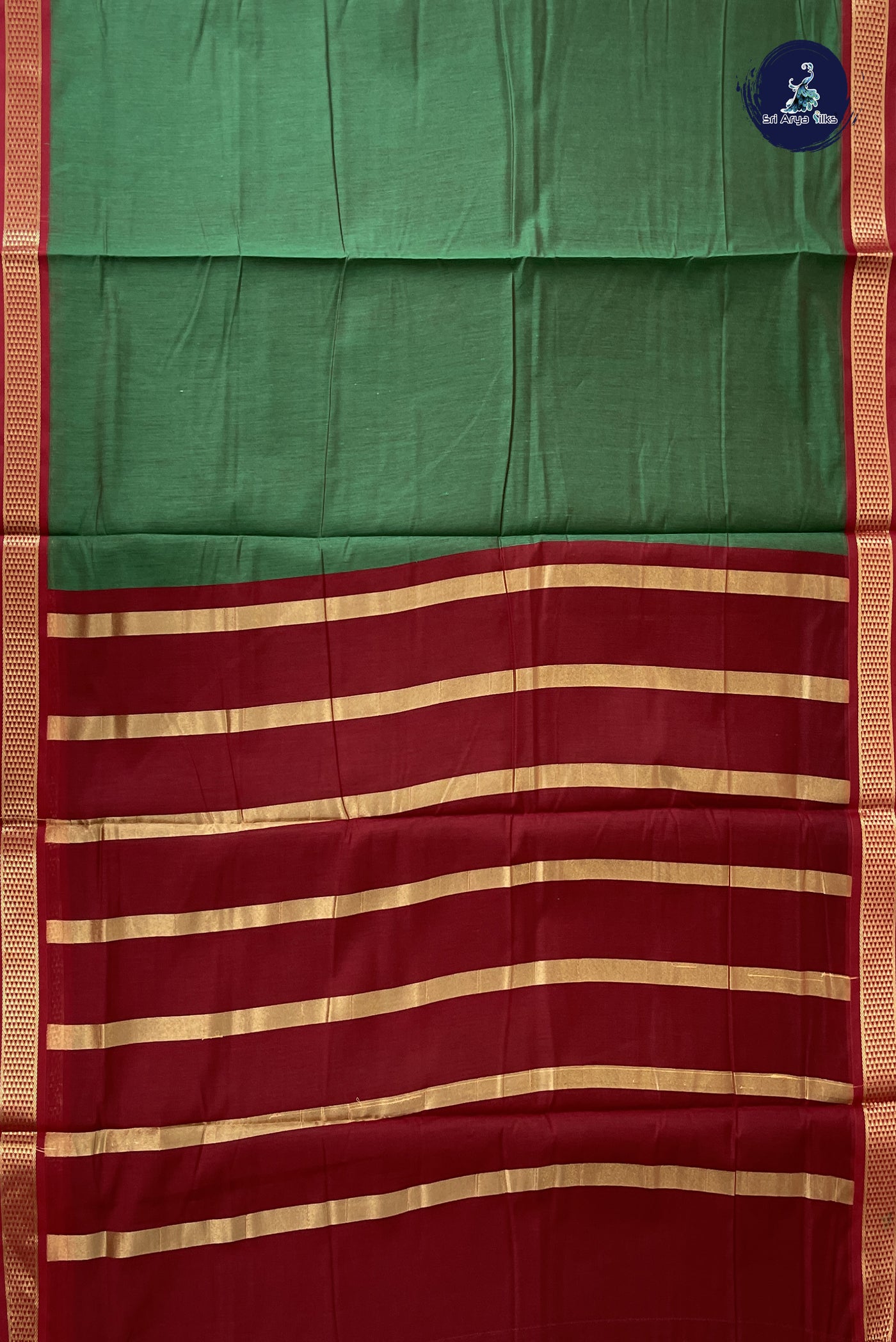 Green Madisar Semi Silk Cotton Saree With Plain Pattern