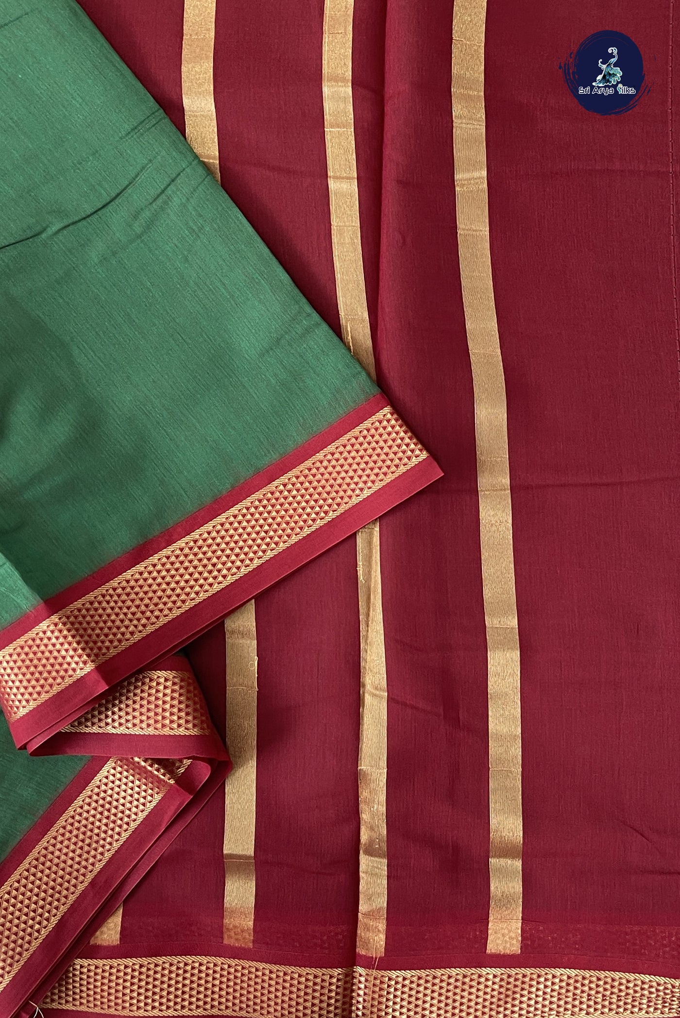 Green Madisar Semi Silk Cotton Saree With Plain Pattern