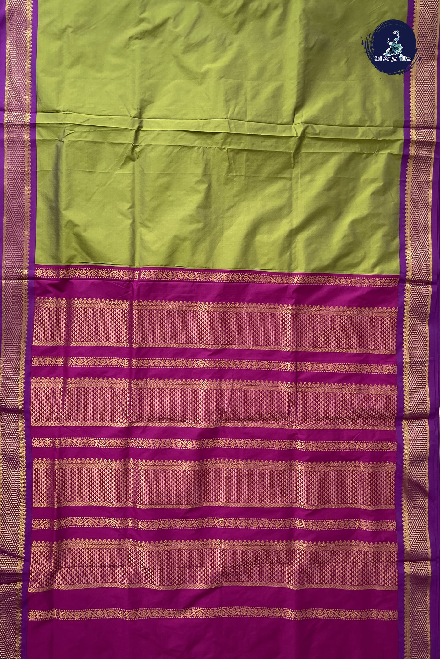 Green Madisar Semi Silk Saree With Plain Pattern