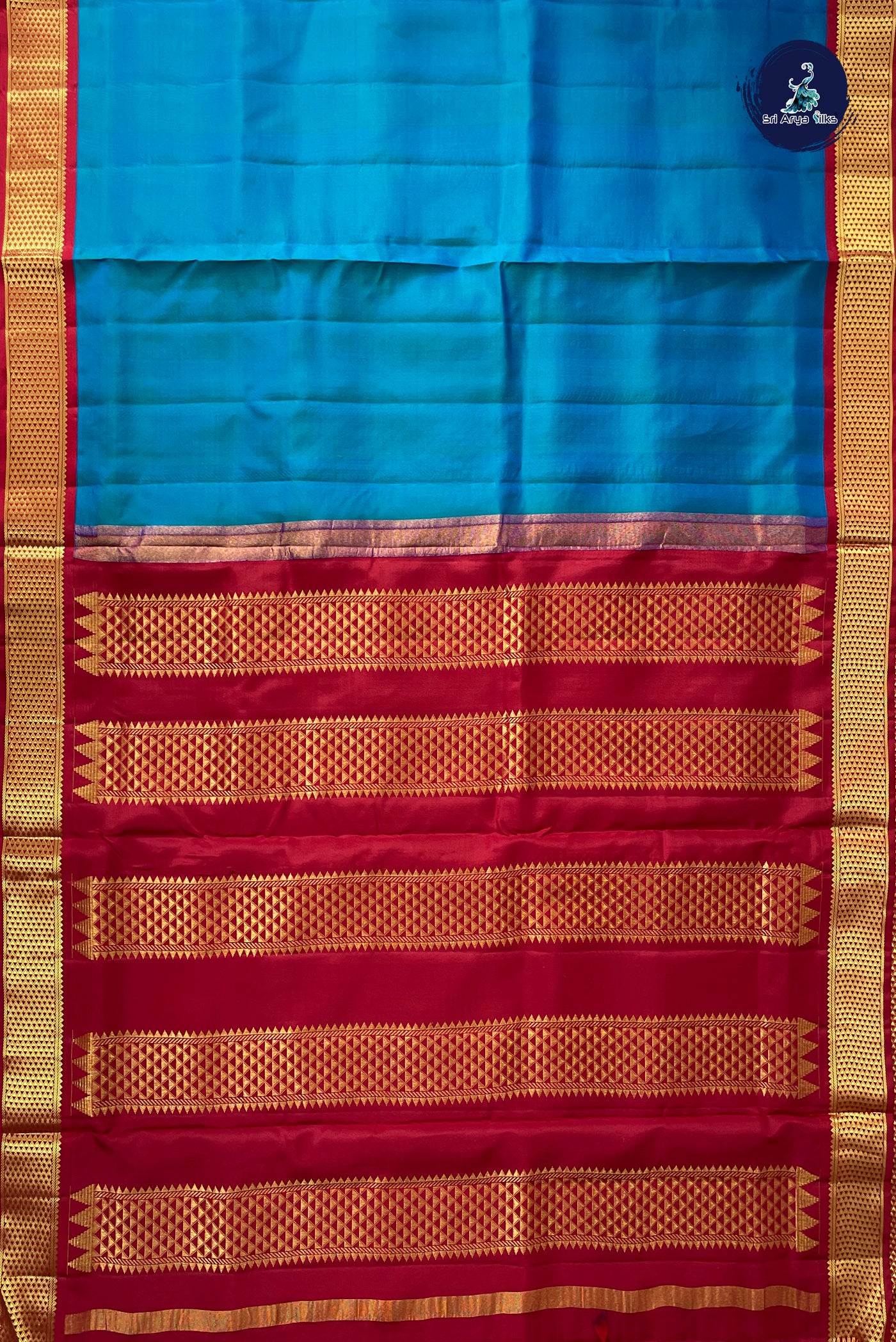 Peacock Blue Madisar 10 Yards Silk Saree With Plain Pattern