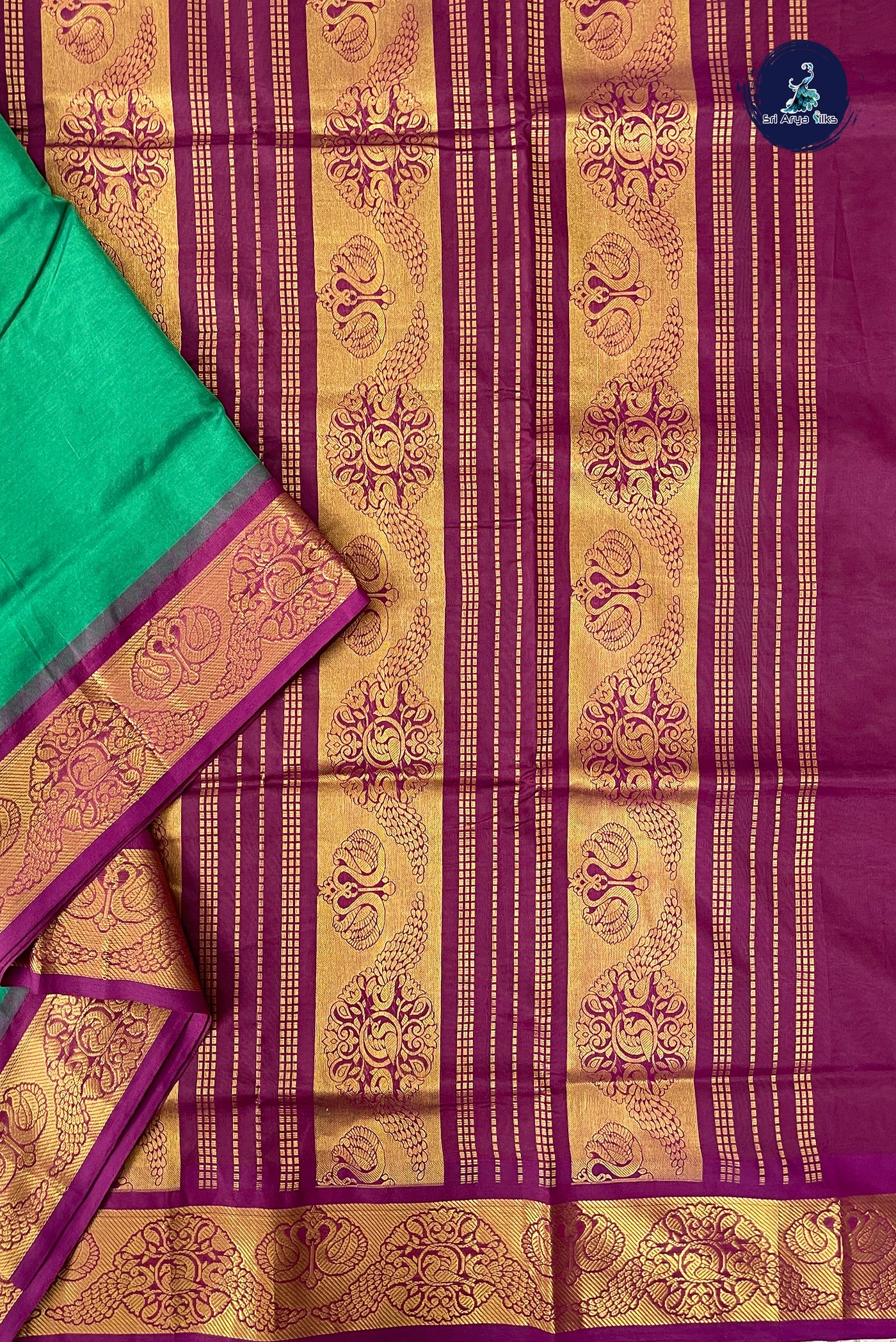 Green Half Pure Madisar Silk Cotton Saree With Plain Pattern