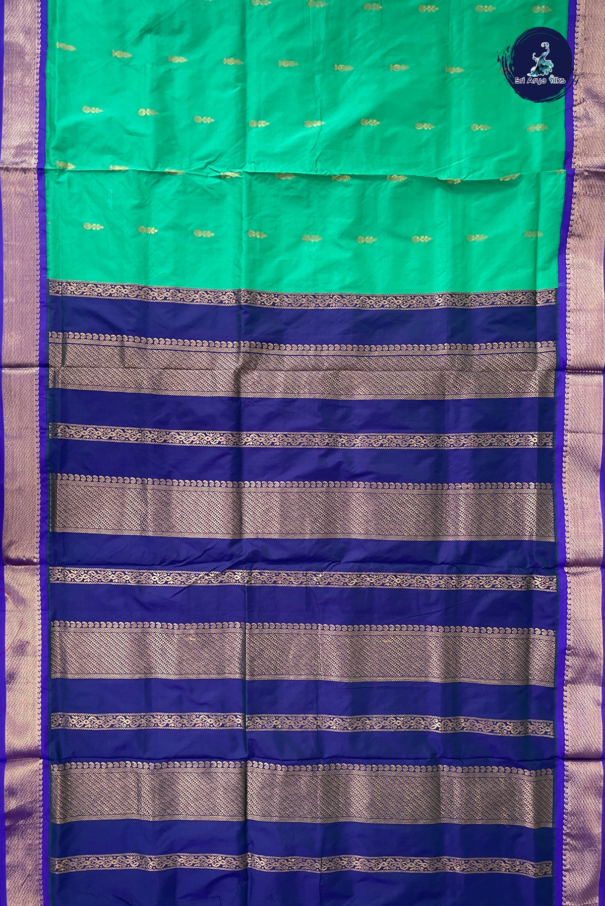 Green Madisar Semi Silk Saree With Zari Buttas Pattern