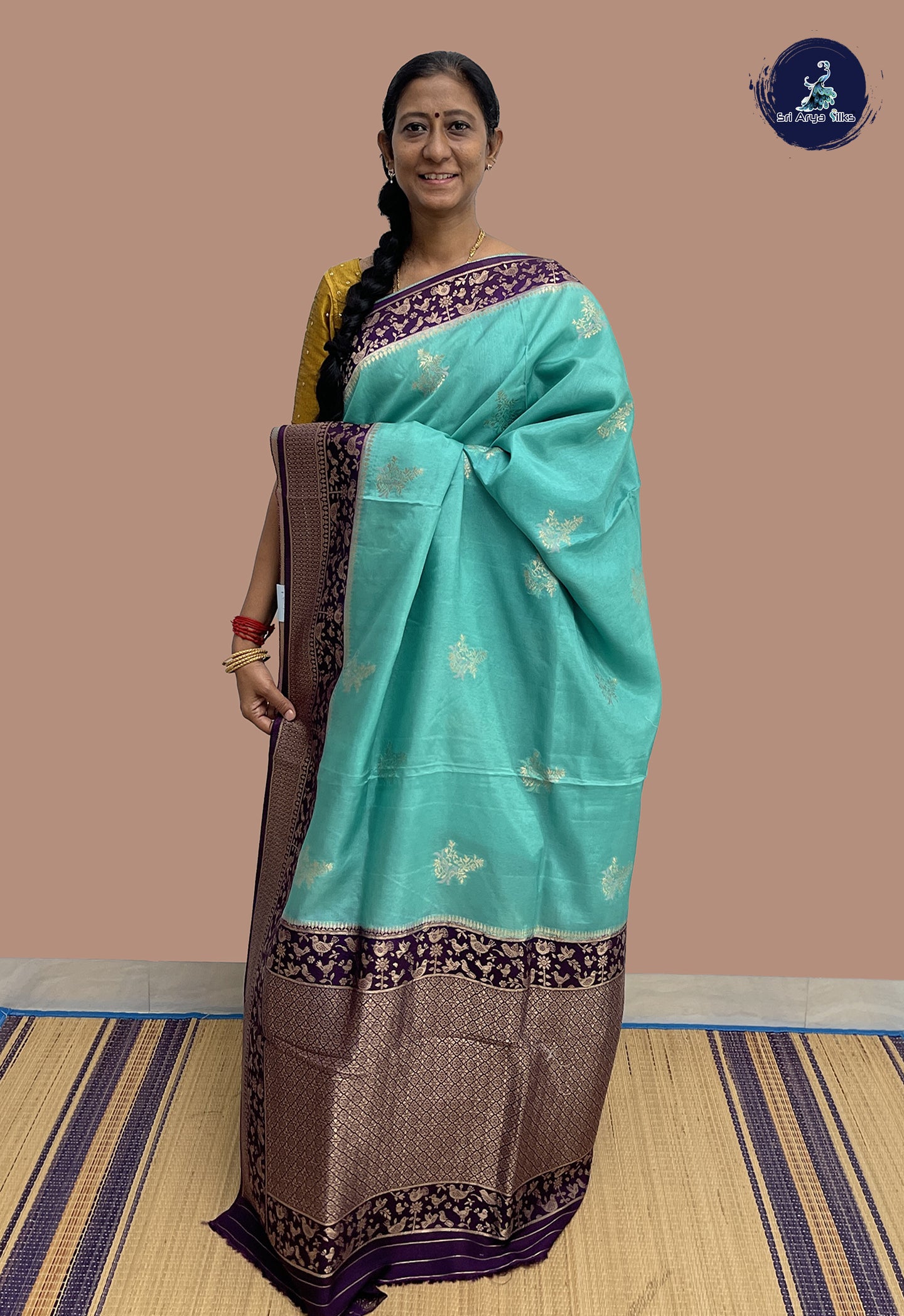 Teal Banarasi Silk Saree With Zari Buttas Pattern