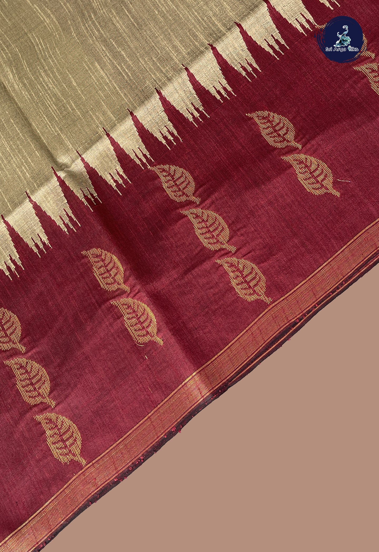 Biscuit Shade Raw Silk Saree With Plain Pattern
