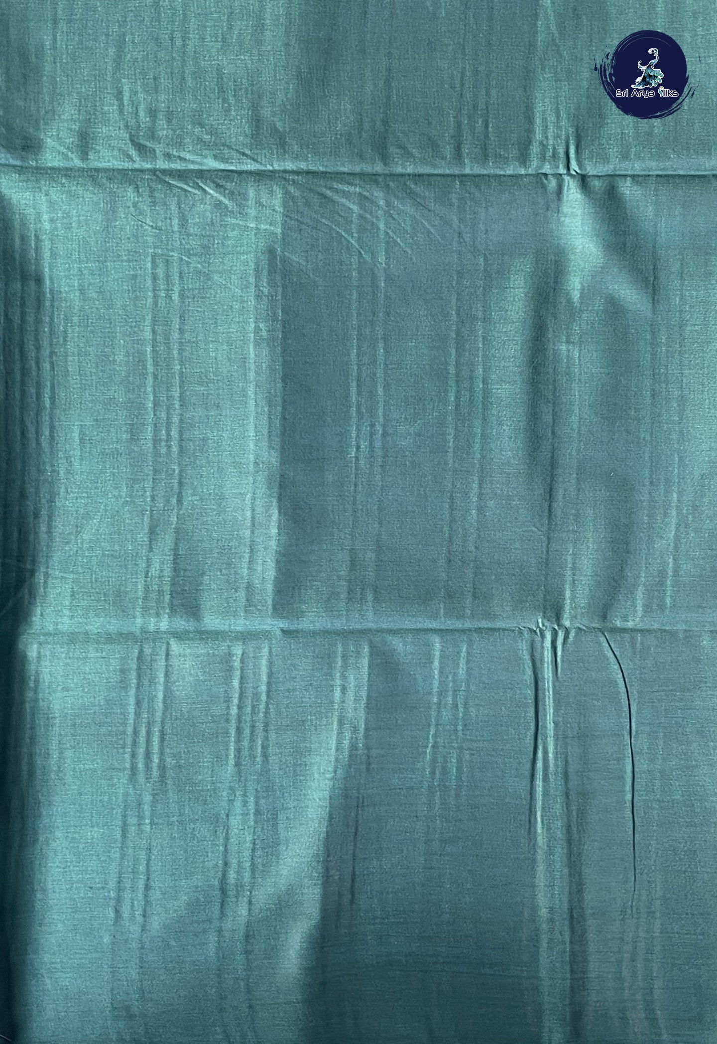 Teal Blue Tussar Saree With Embossed Pattern