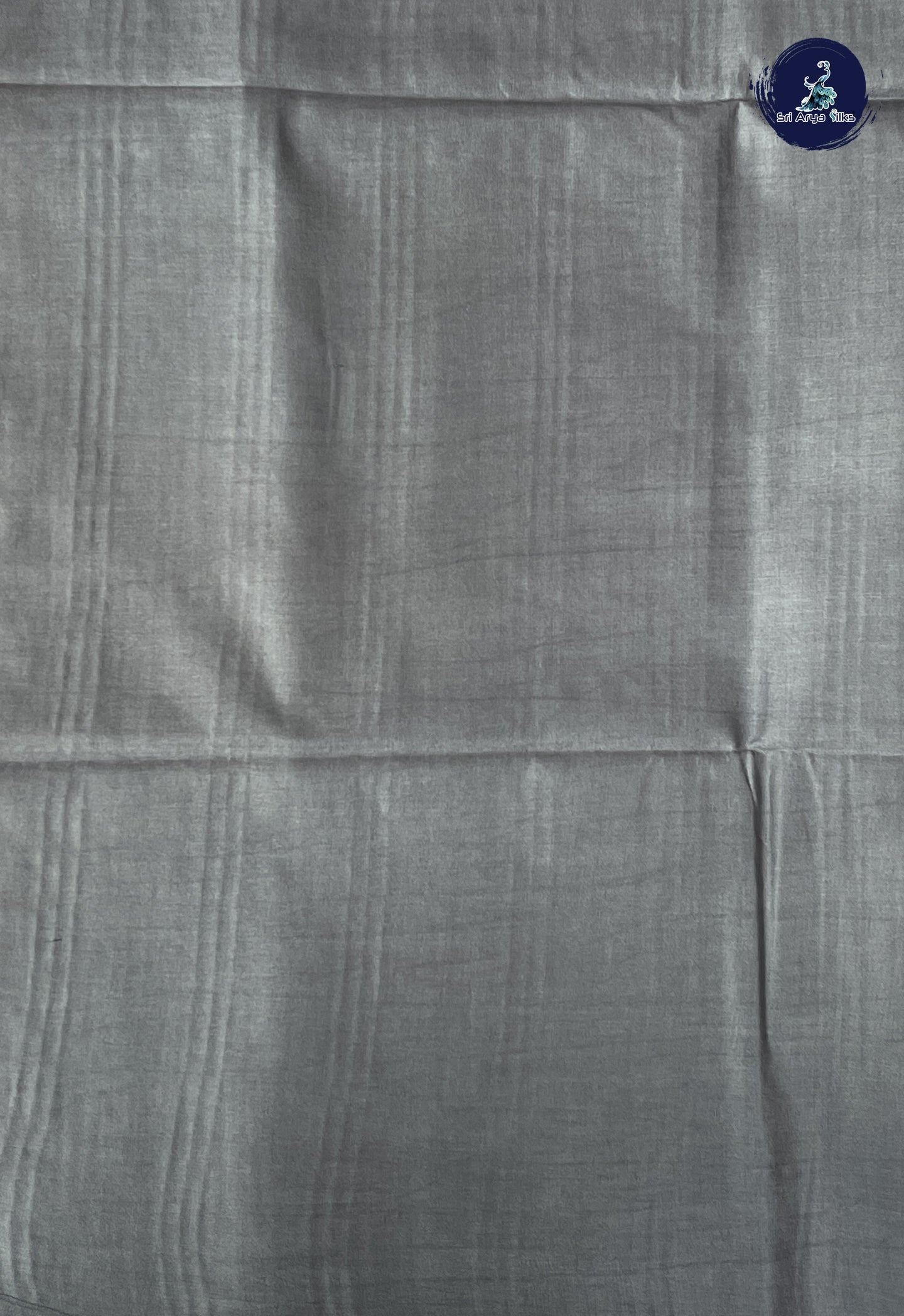 Light Burgundy Tussar Saree With Embossed Pattern