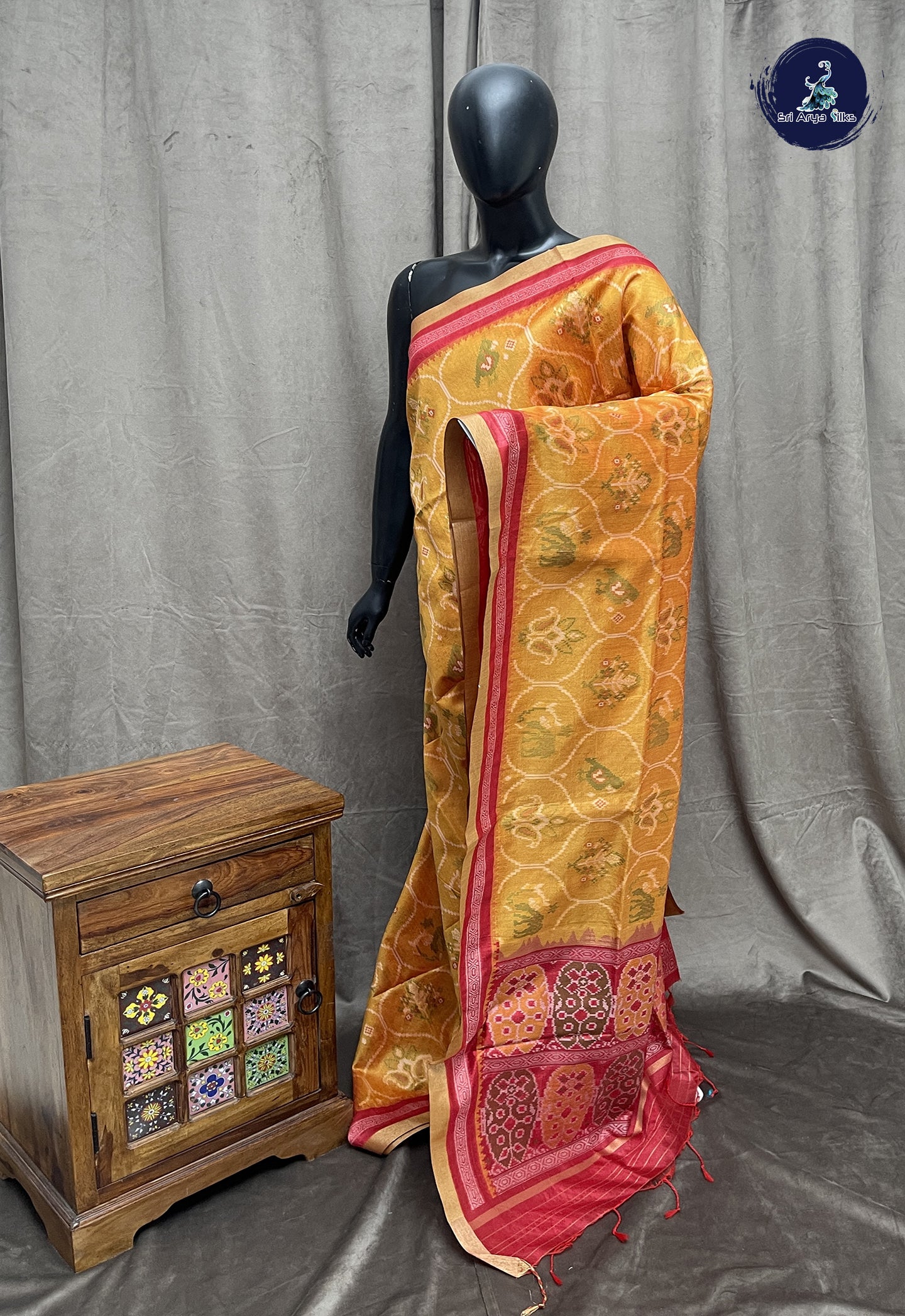 Lite Mustard Orange Semi Raw Silk Saree With Ikat Pattern